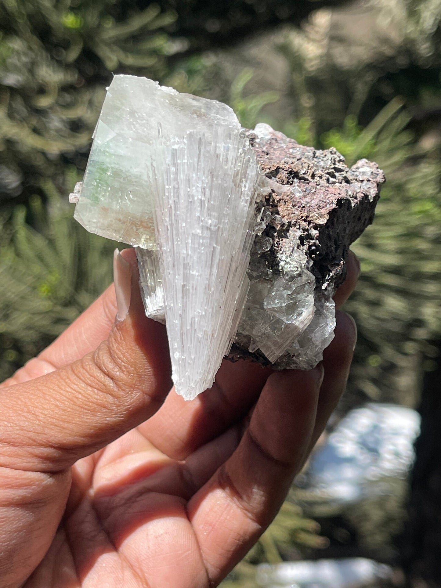 Green apophyllite cube with scolecite spray