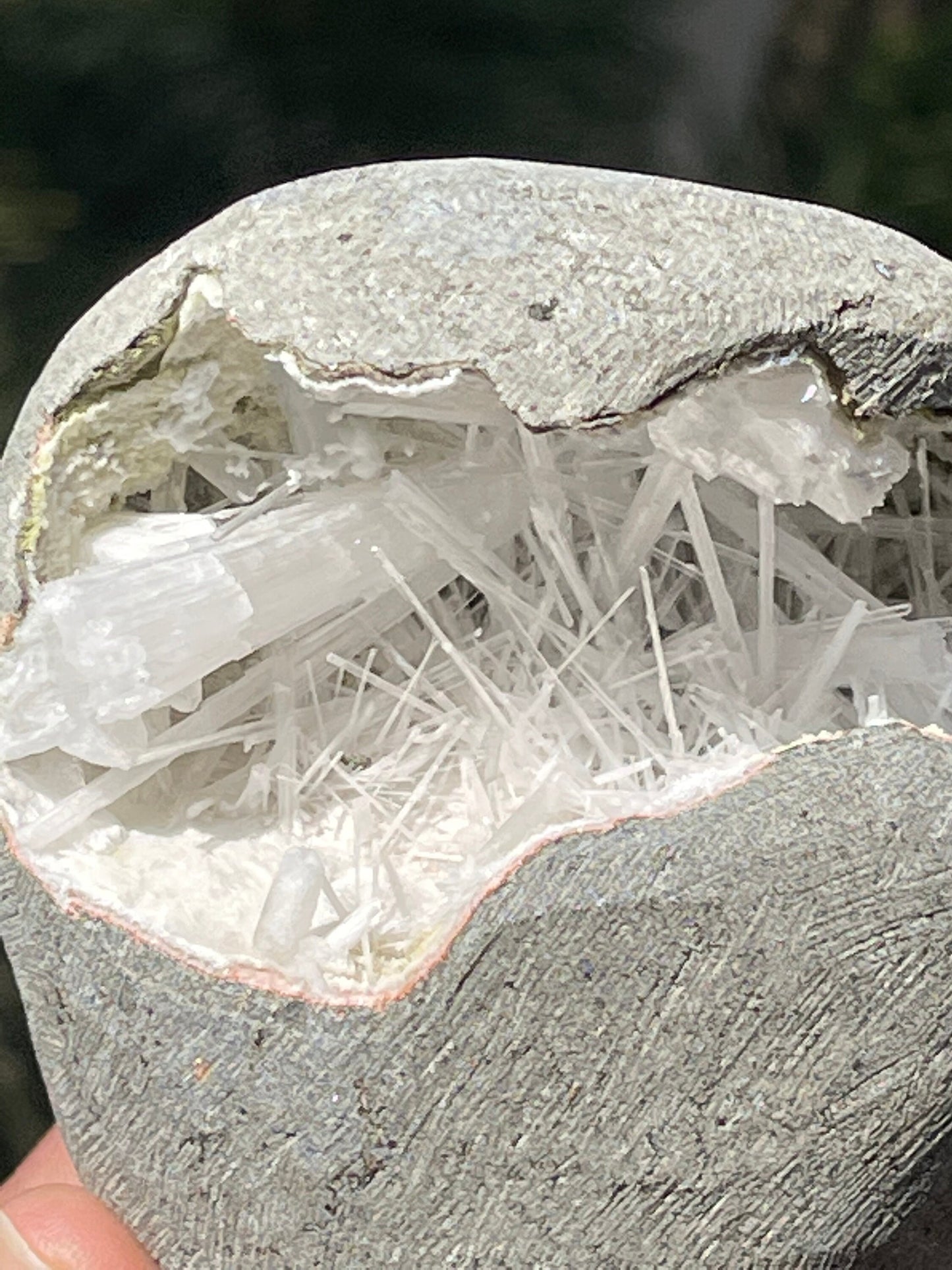 Scolecite crystals inside geode