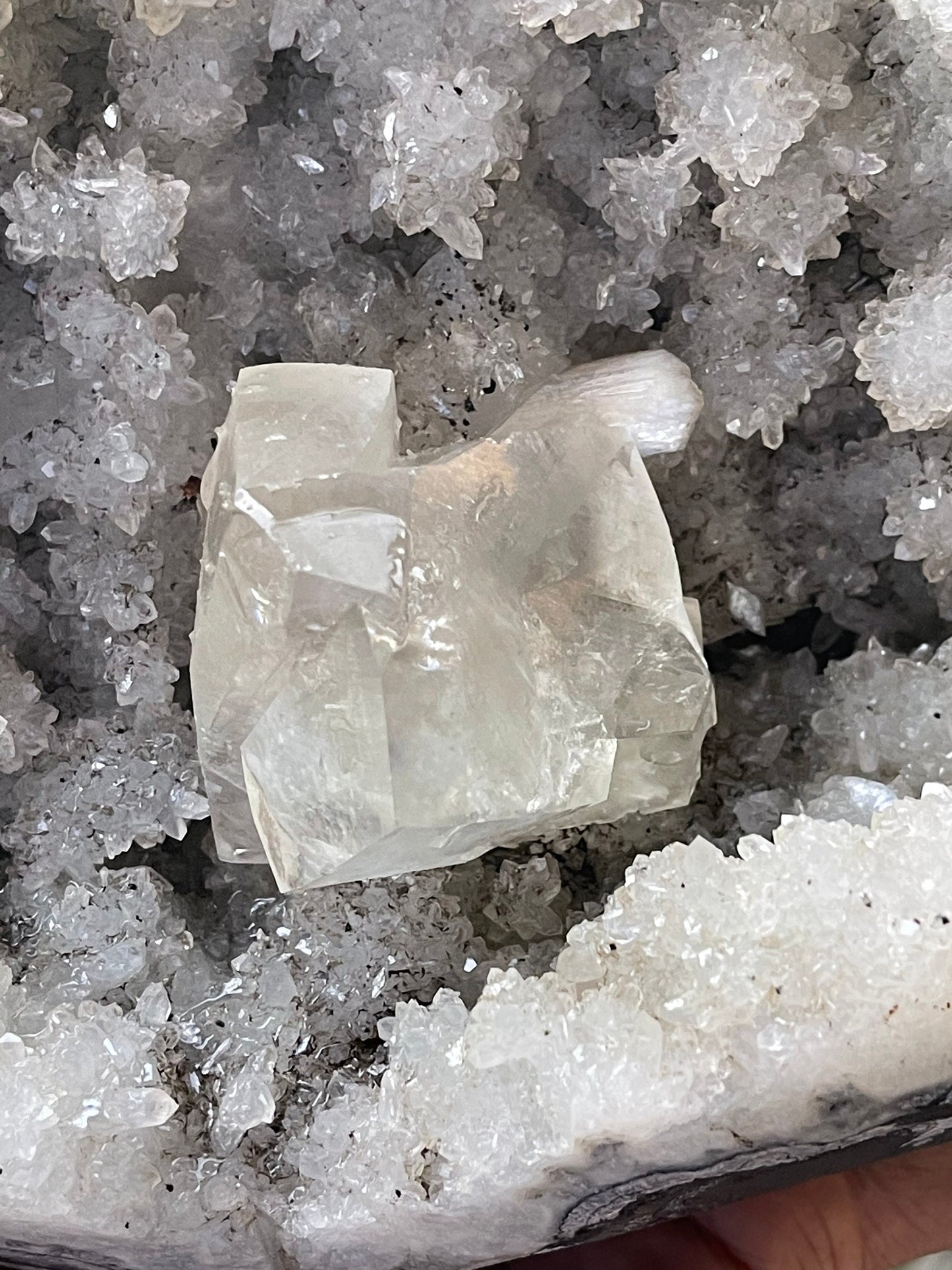 Natural calcite cube on chalcedony coral