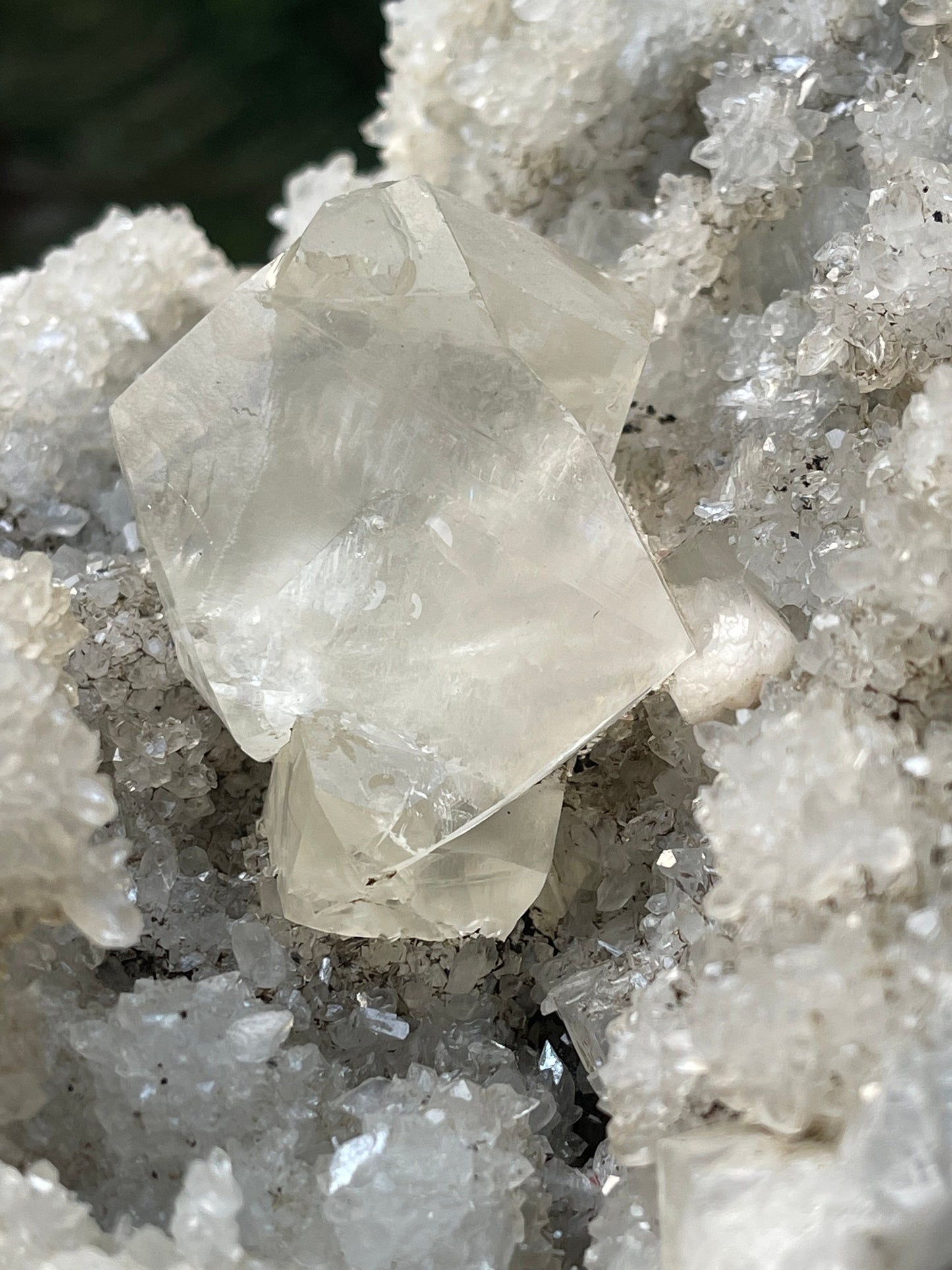 Natural calcite cube on chalcedony coral