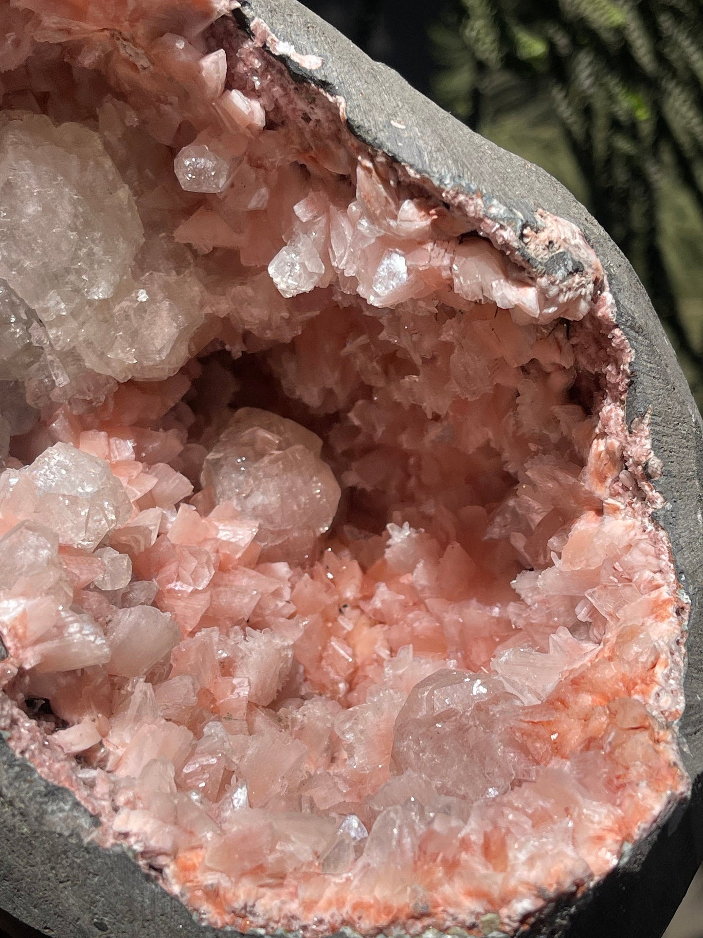 Orange heulandite with apophyllite inside geode