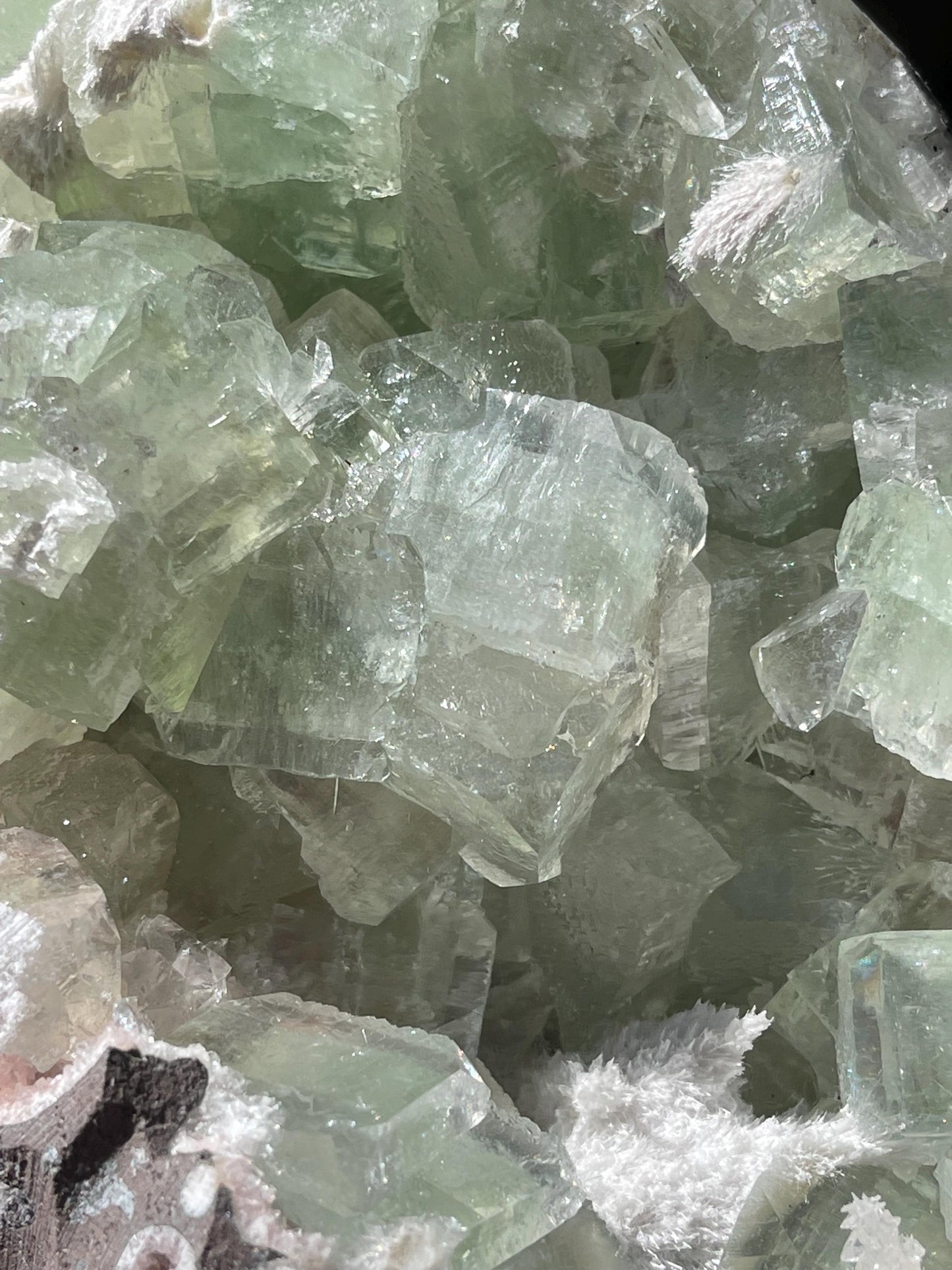 okenite mineral on green apophyllite matrix