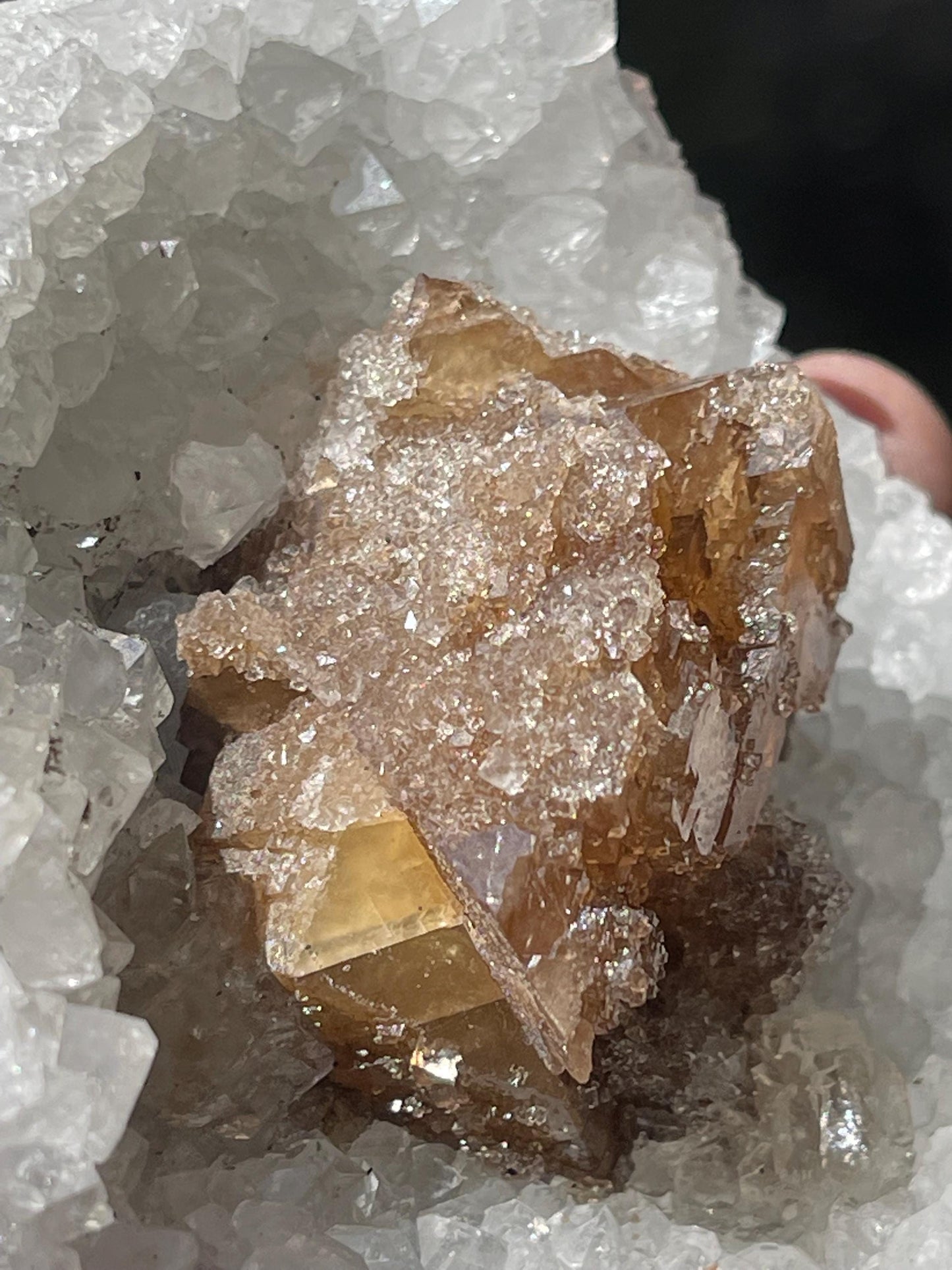 natural brown calcite crystal on quartz