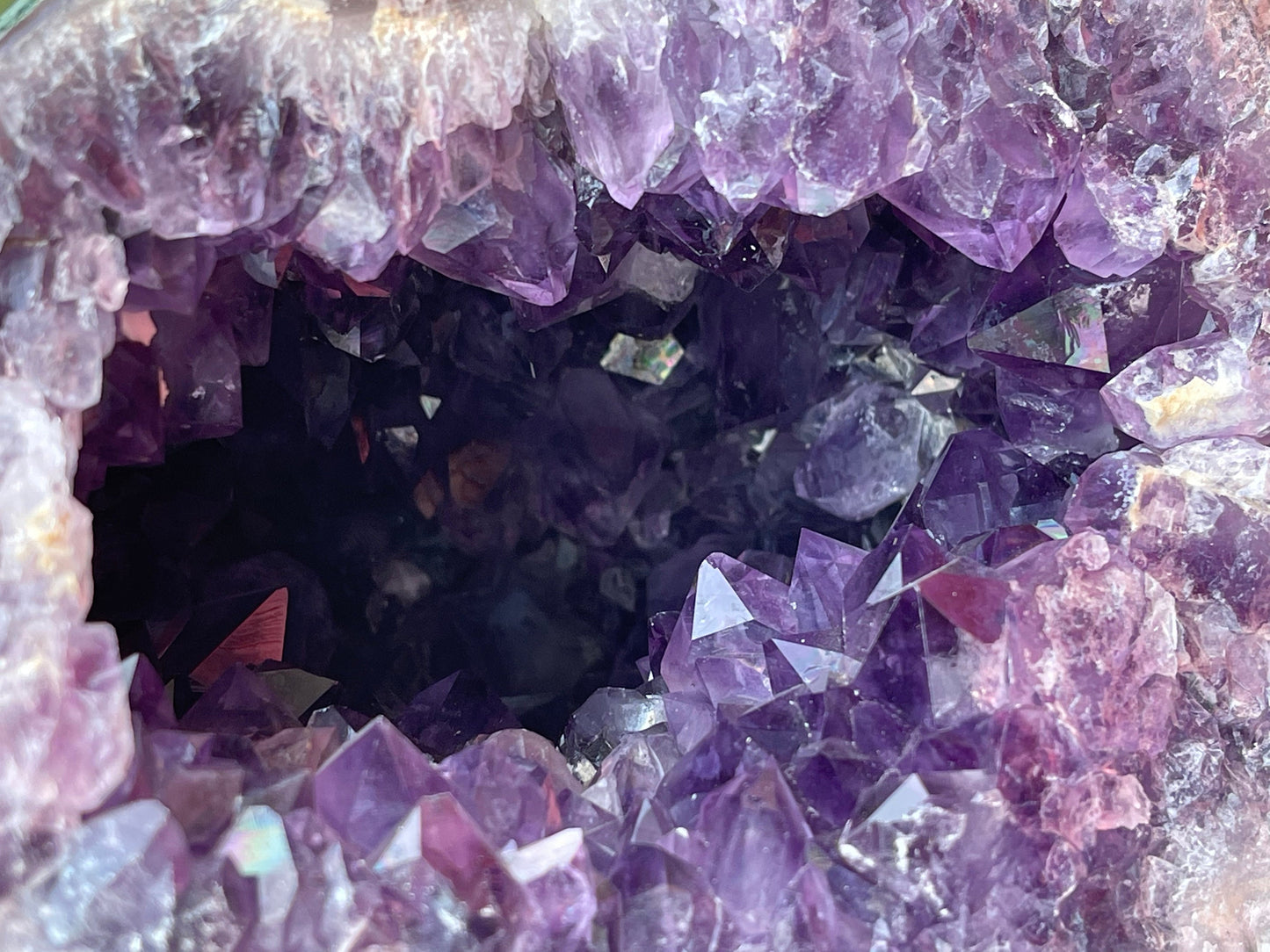 Natural amethyst geode with Okenite.