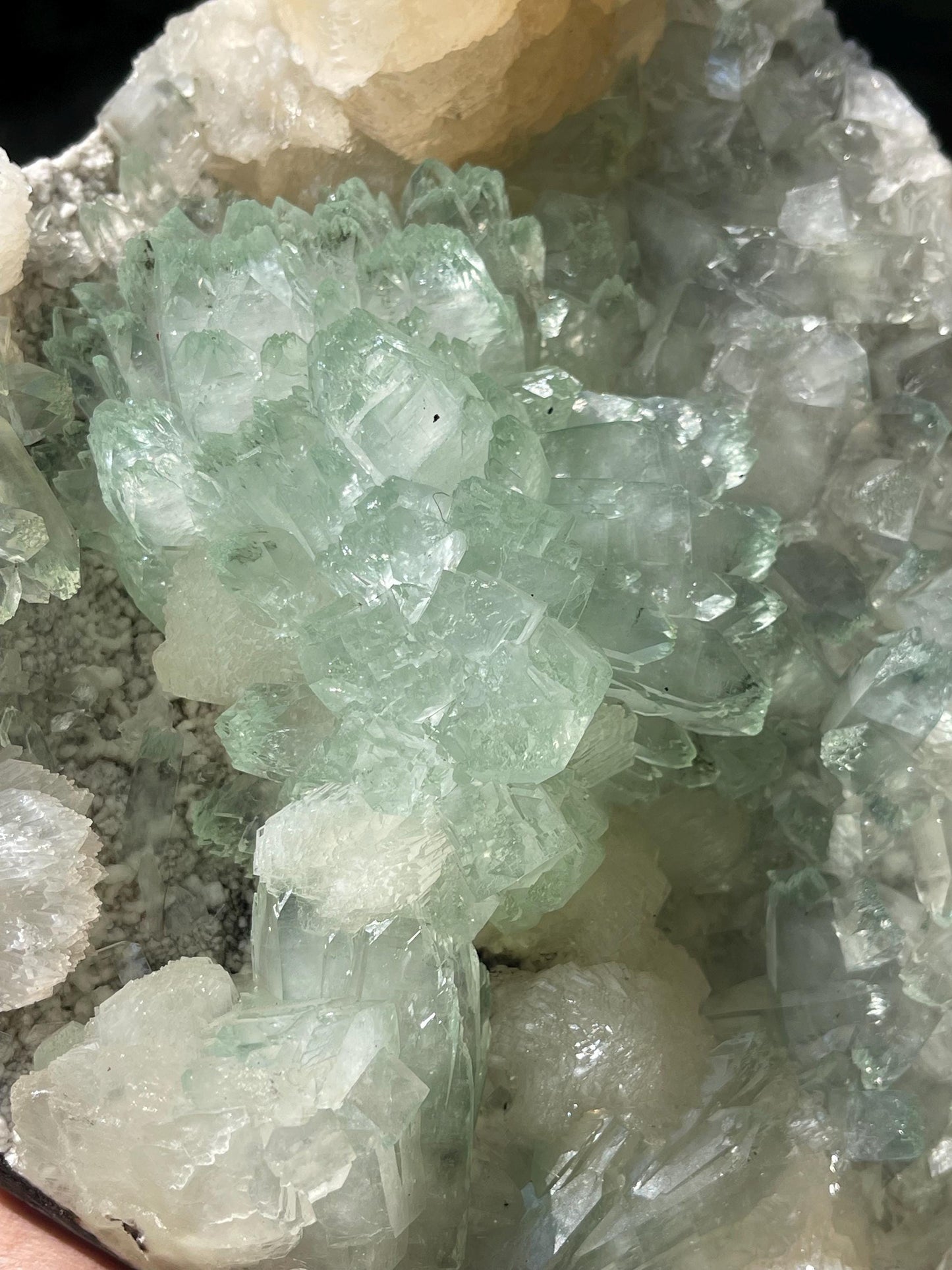light green apophyllite flower with stilbite
