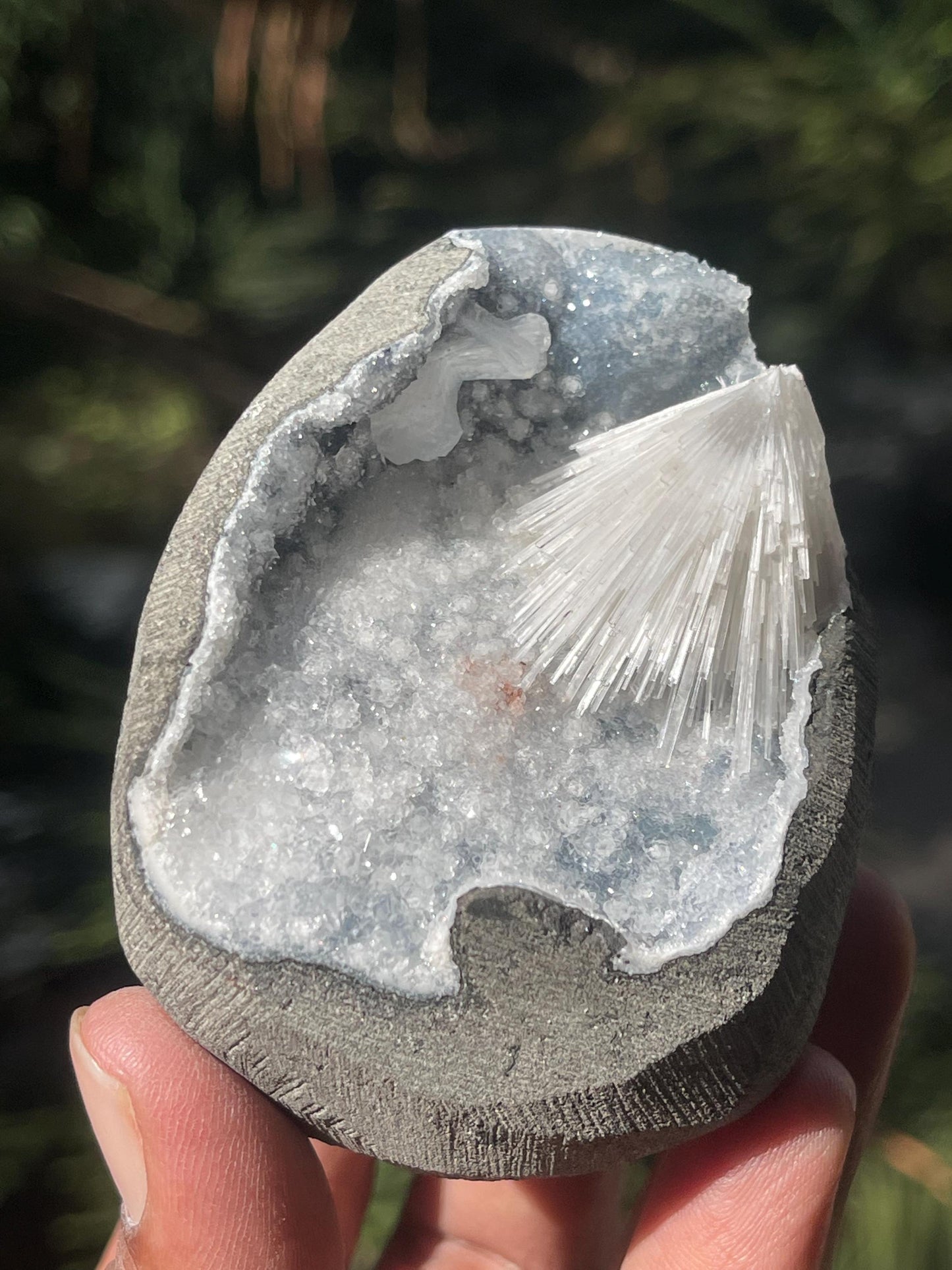 Scolecite flower on blue quartz