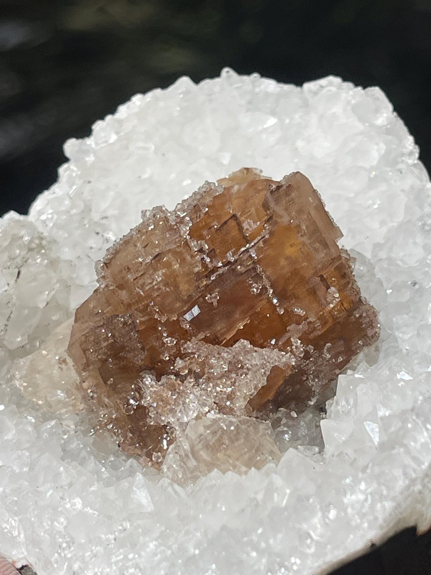 natural brown calcite crystal on quartz