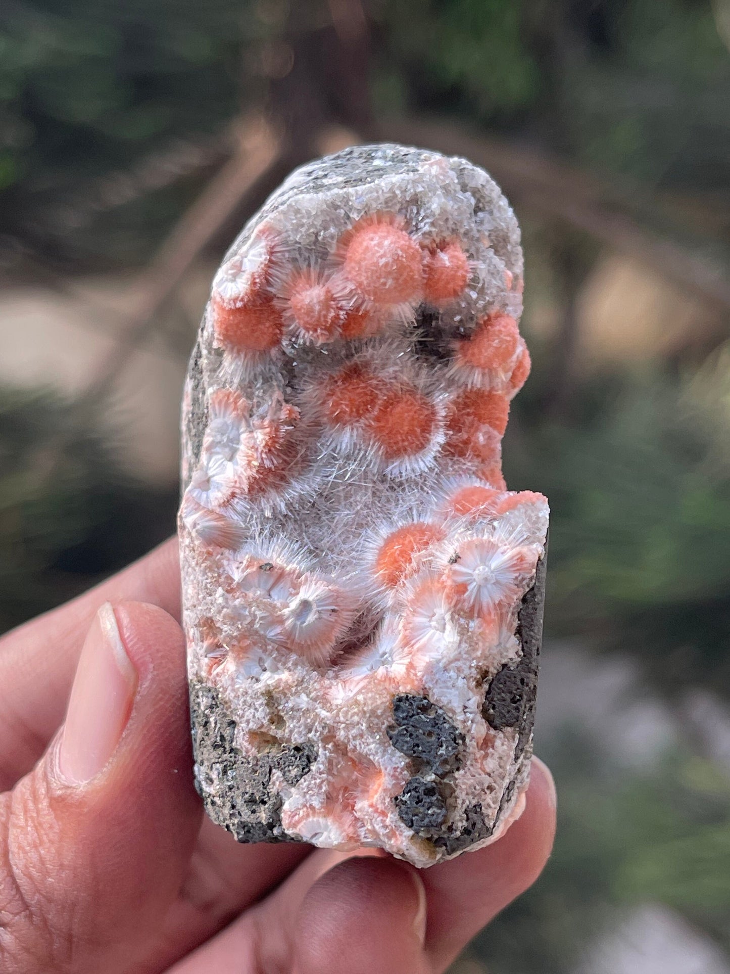 Orange mesolite balls on heulandite matrix