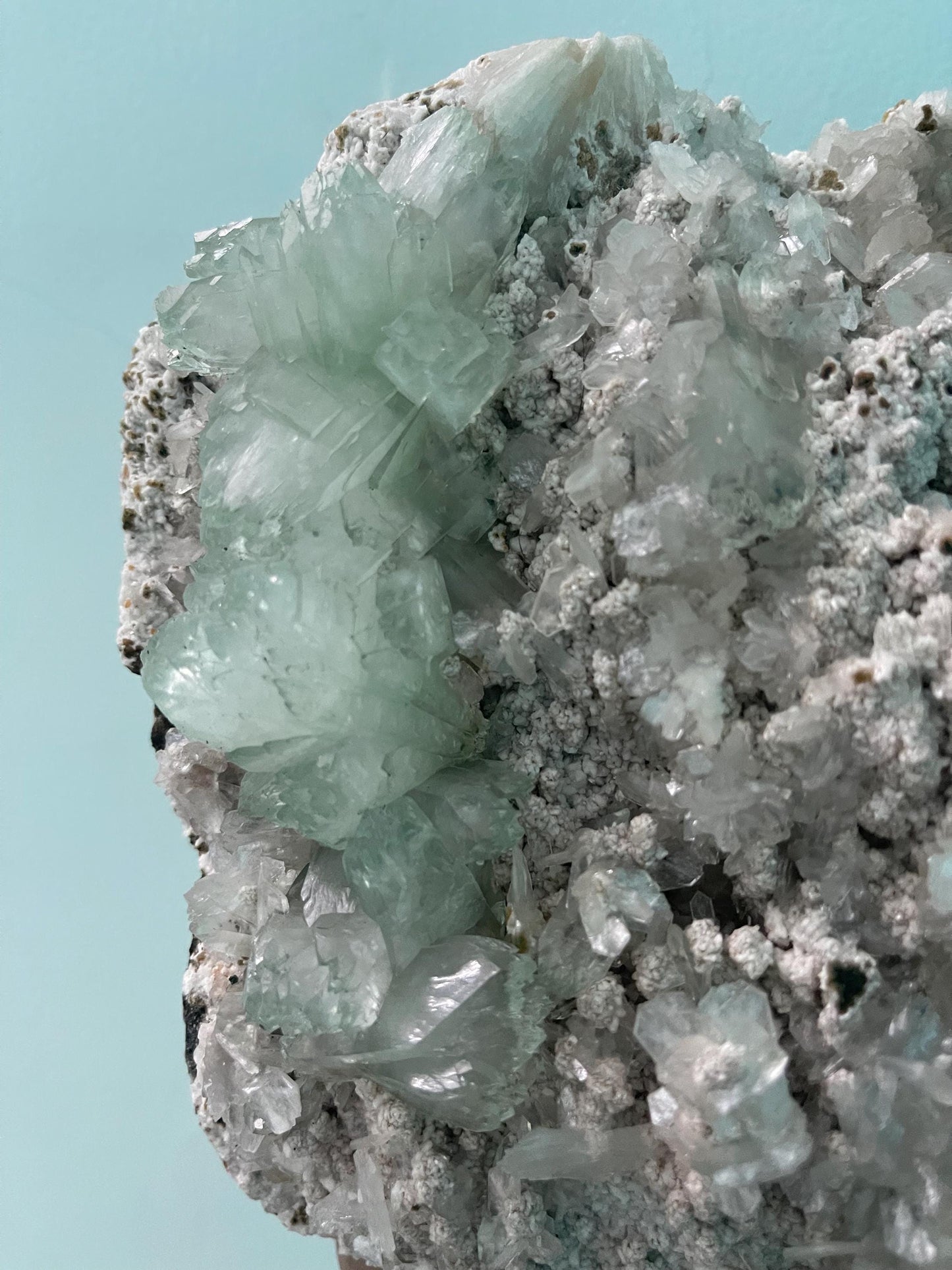 light green apophyllite crystal flower on white chalcedony matrix with stilbite