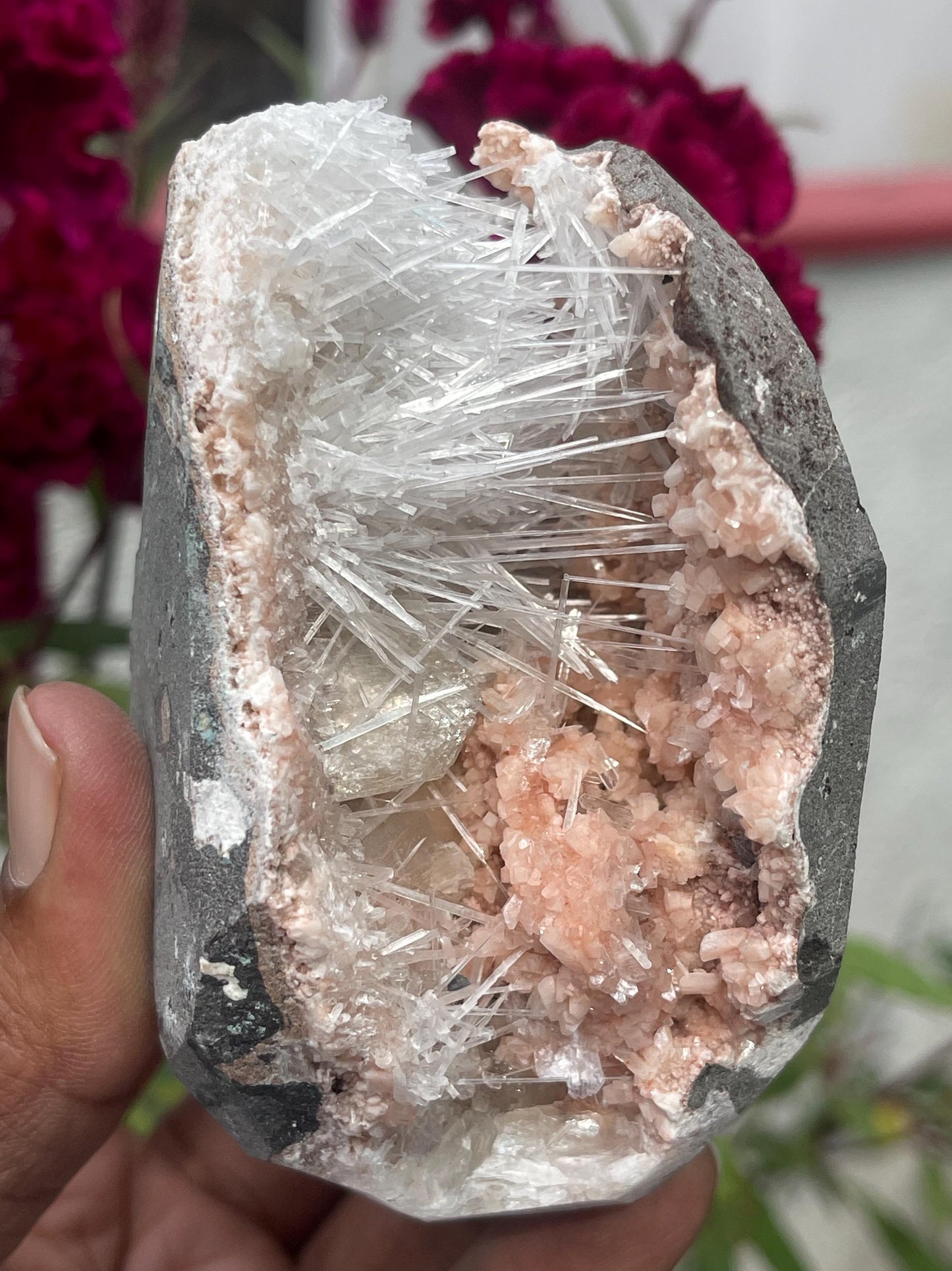 Scolecite spray with stilbite crystal inside orange heulandite geode