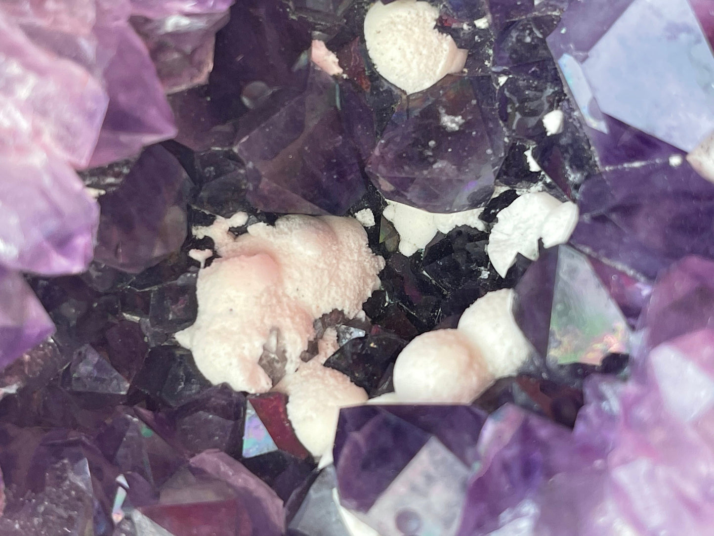 Natural amethyst geode with Okenite.