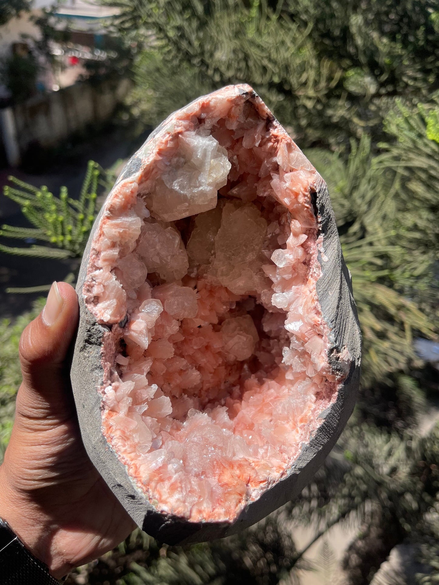 Orange heulandite with apophyllite inside geode