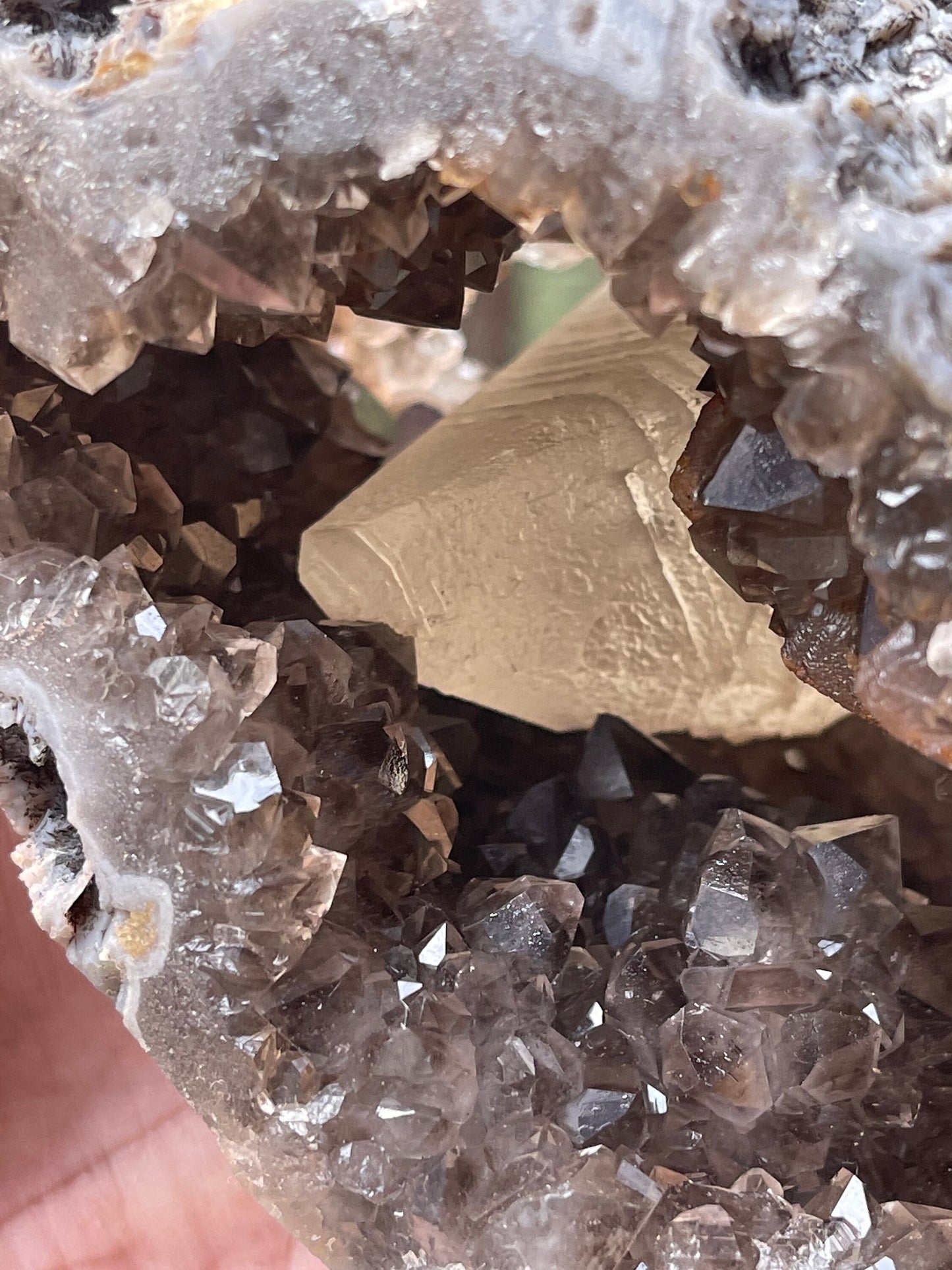 Rare formation of calcite crystal on amethyst natural specimen