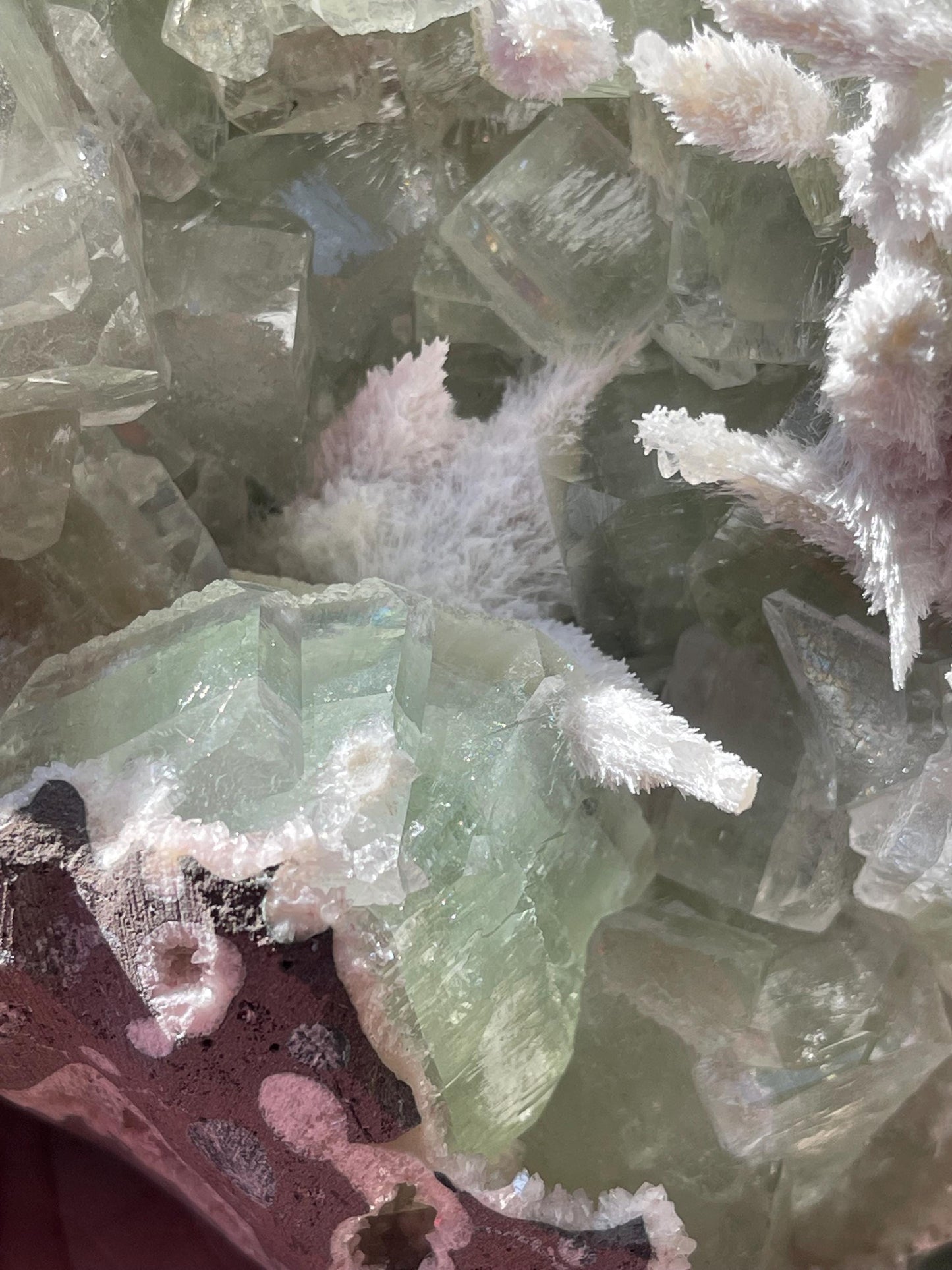 okenite mineral on green apophyllite matrix