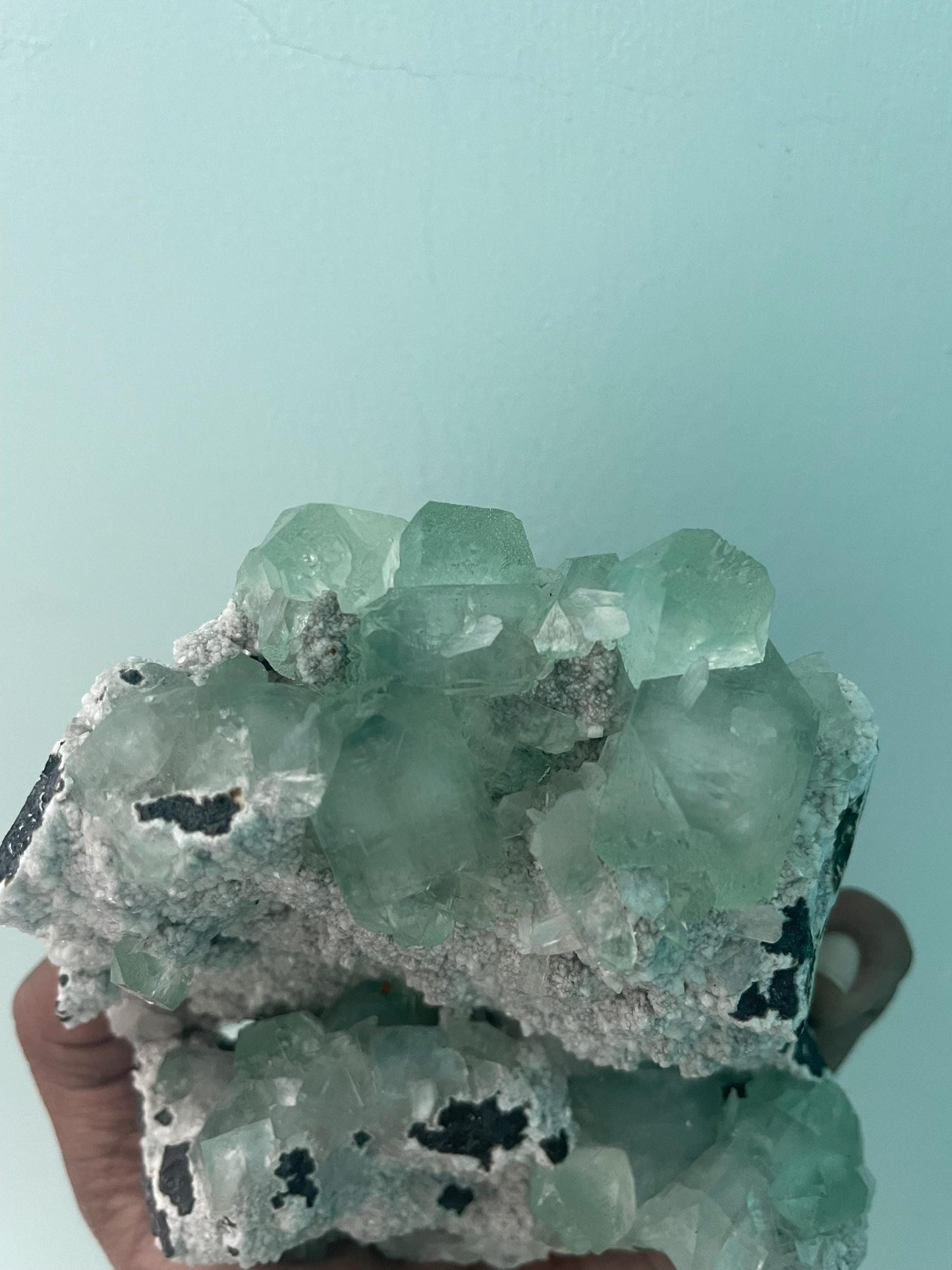 green apophyllite crystals on white chalcedony matrix