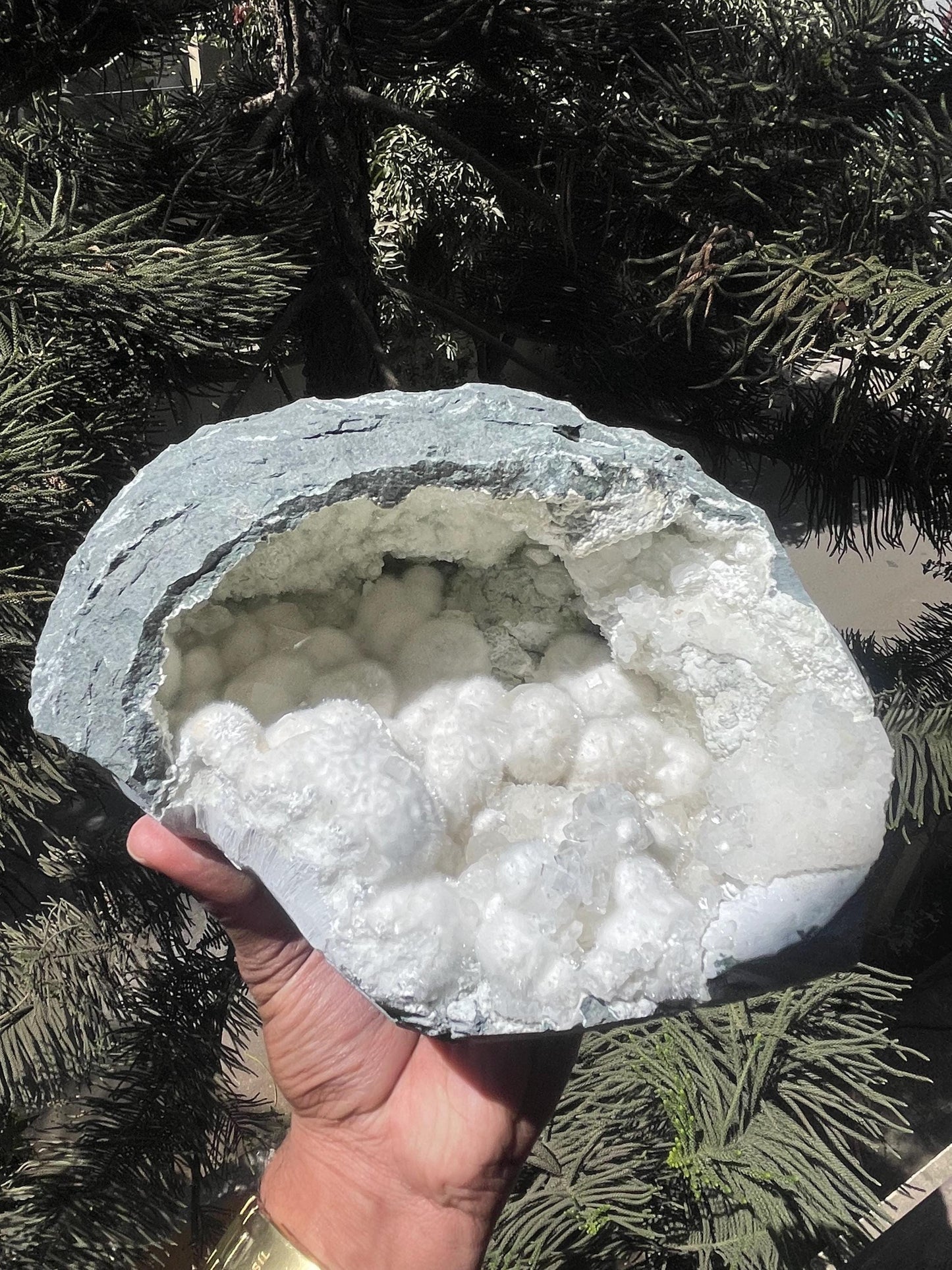 okenite big puffs balls on apophyllite inside geode