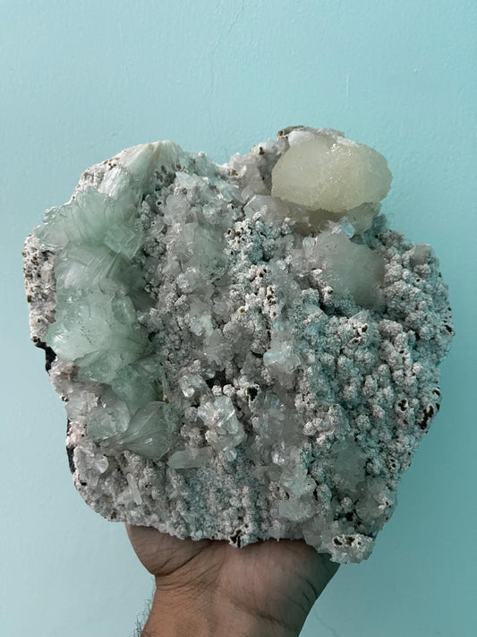 light green apophyllite crystal flower on white chalcedony matrix with stilbite
