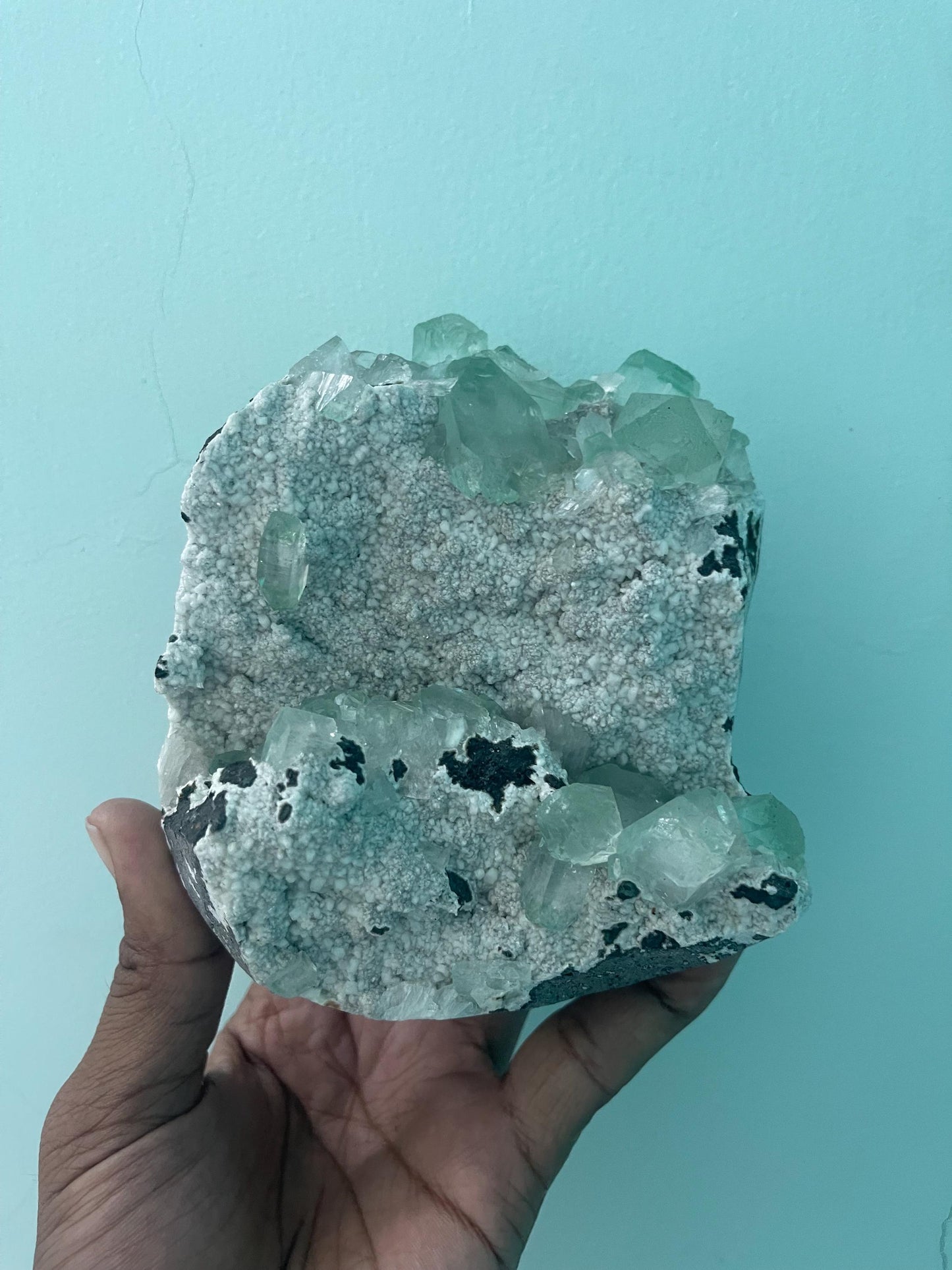 green apophyllite crystals on white chalcedony matrix