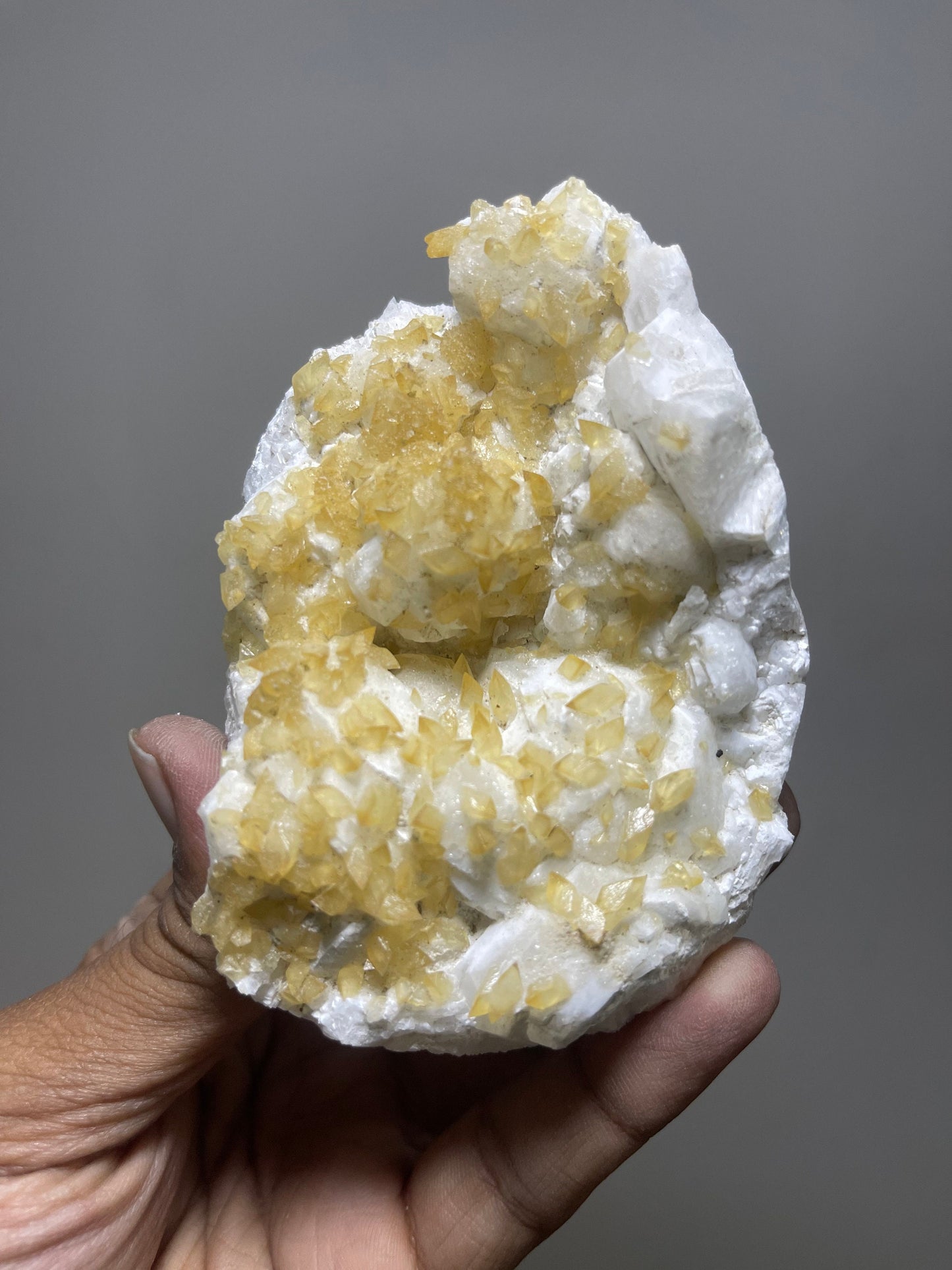 Rare find ..! Golden calcite  crystal on white apophyllite