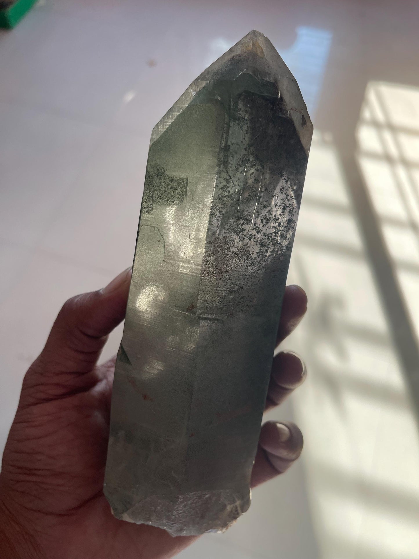 big size of Himalayan crystal inside green phantom inclusions