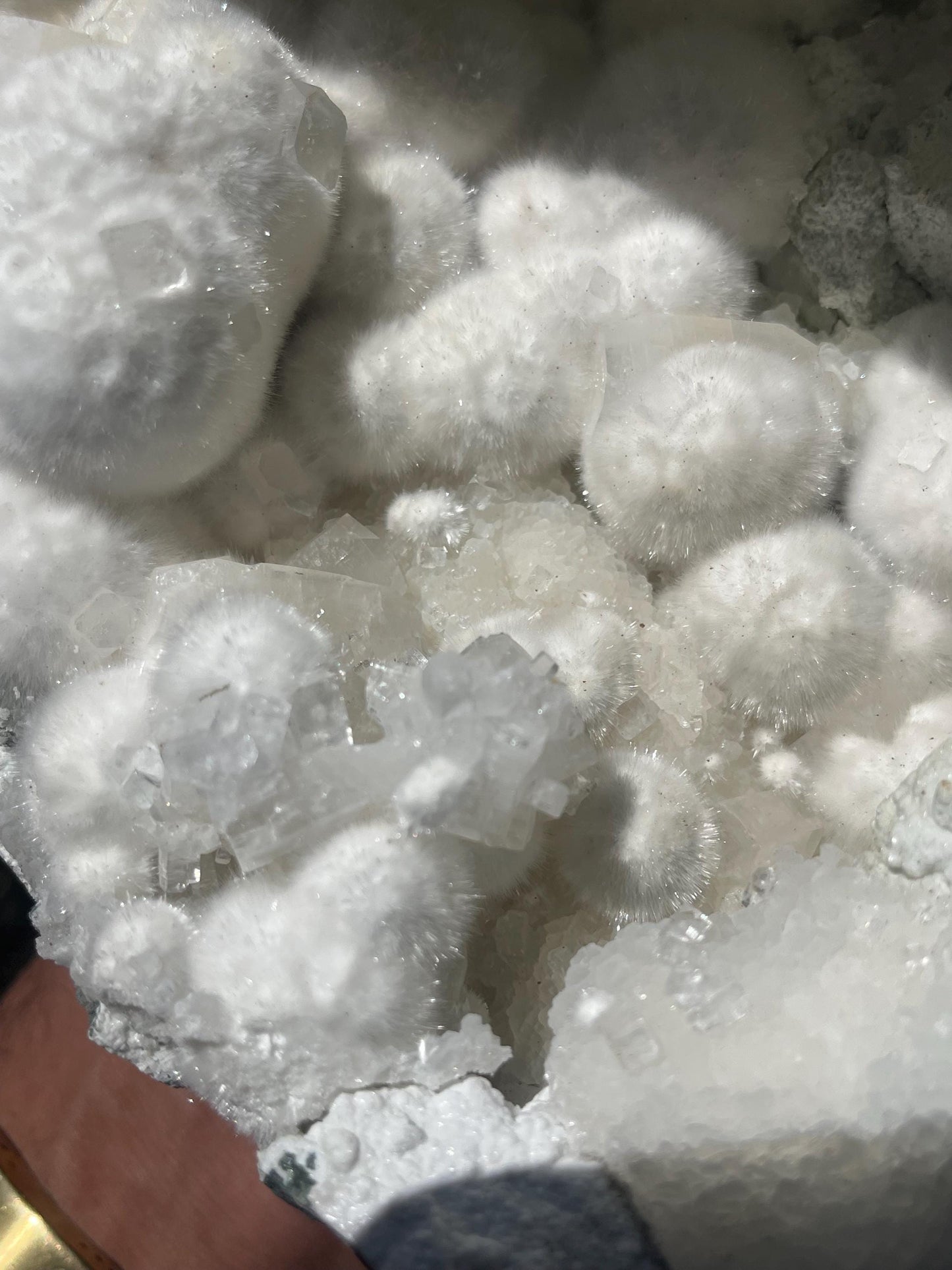 okenite big puffs balls on apophyllite inside geode