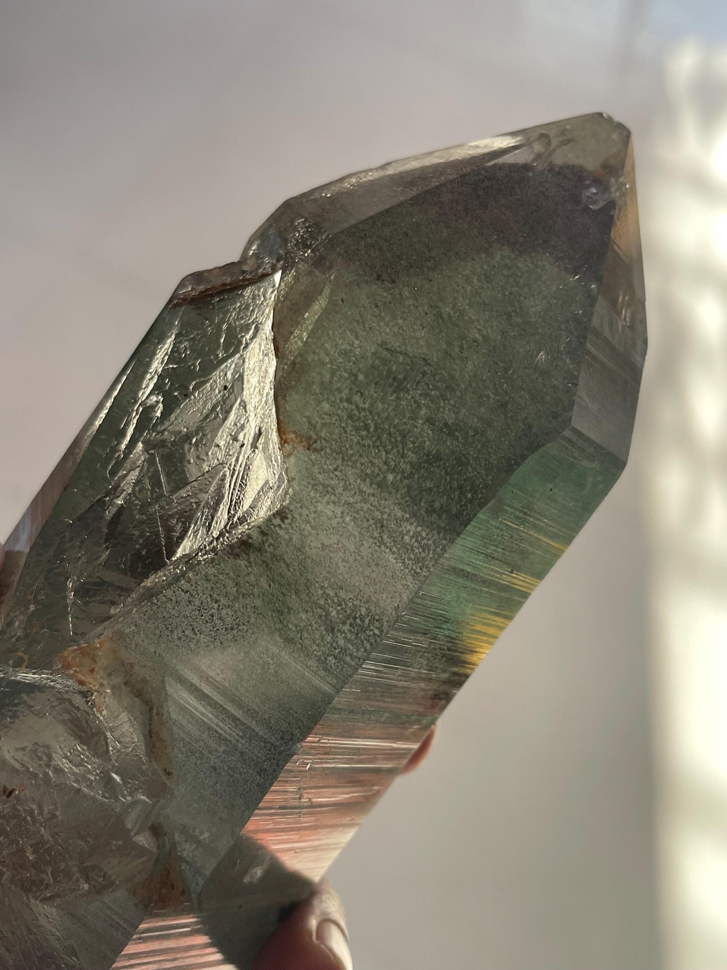 big size of Himalayan crystal inside green phantom inclusions