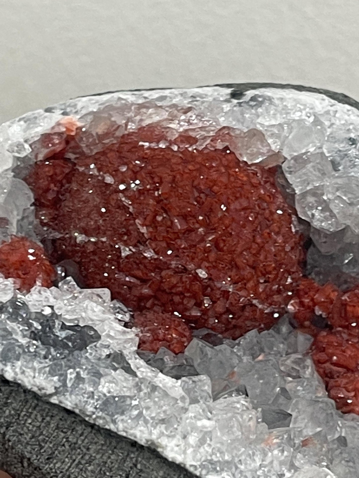 Rare find .. Red fluoride ball on blue quartz crystal