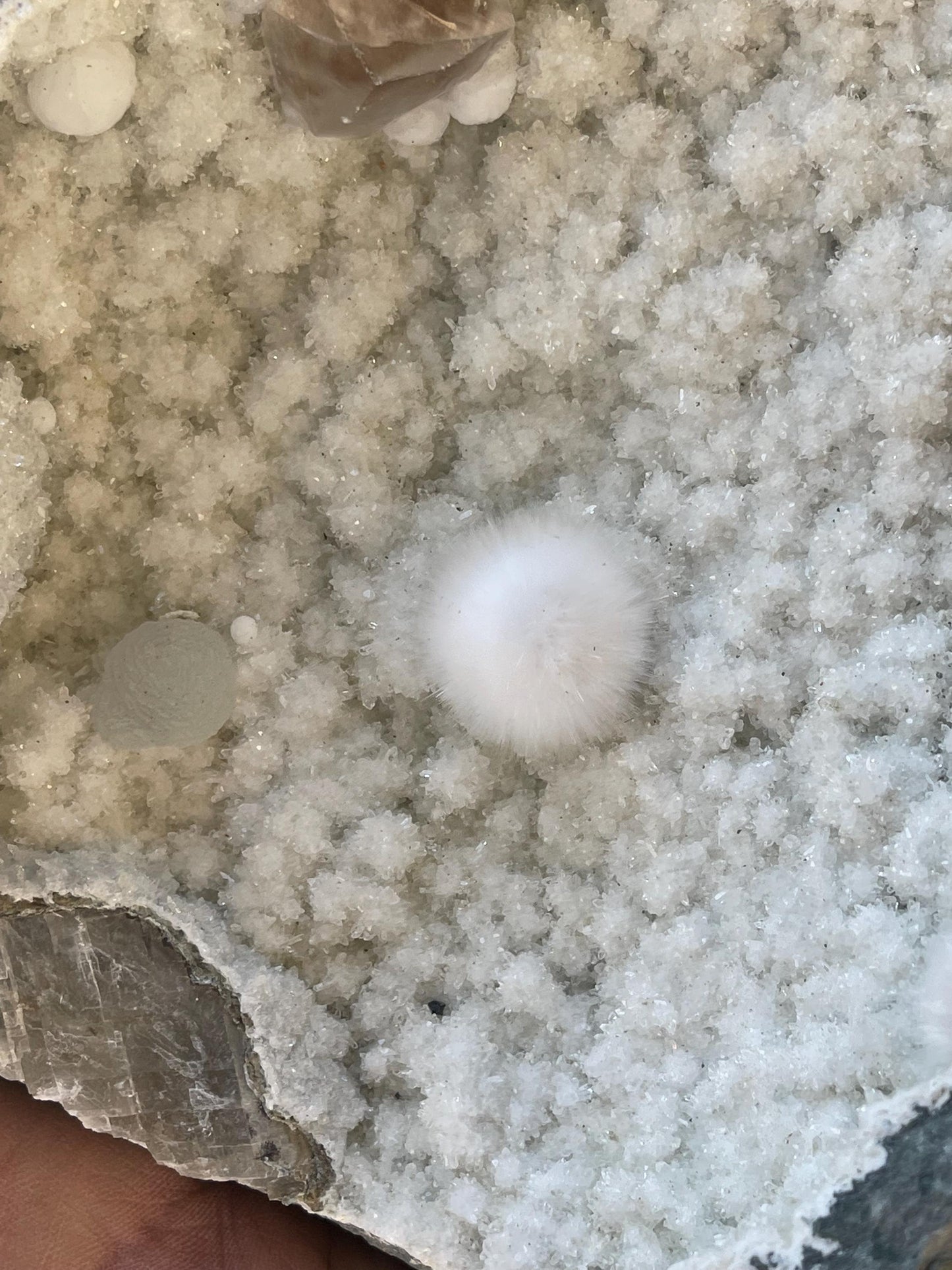 combination of okenite calcite gyrolite on white chalcedony matrix