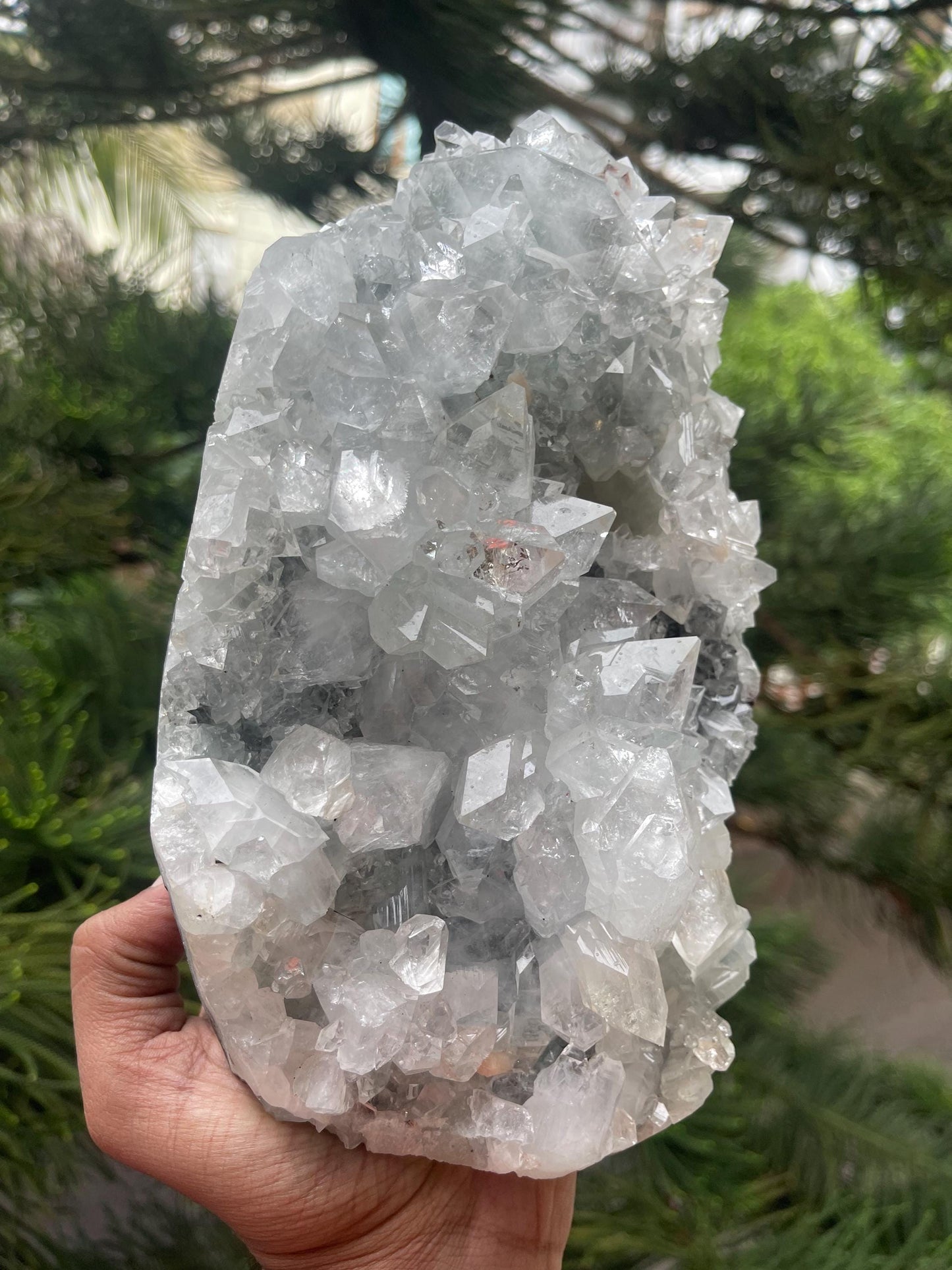 Glossy apophyllite crystal with stilbite on blue chalcedony matrix standing piece