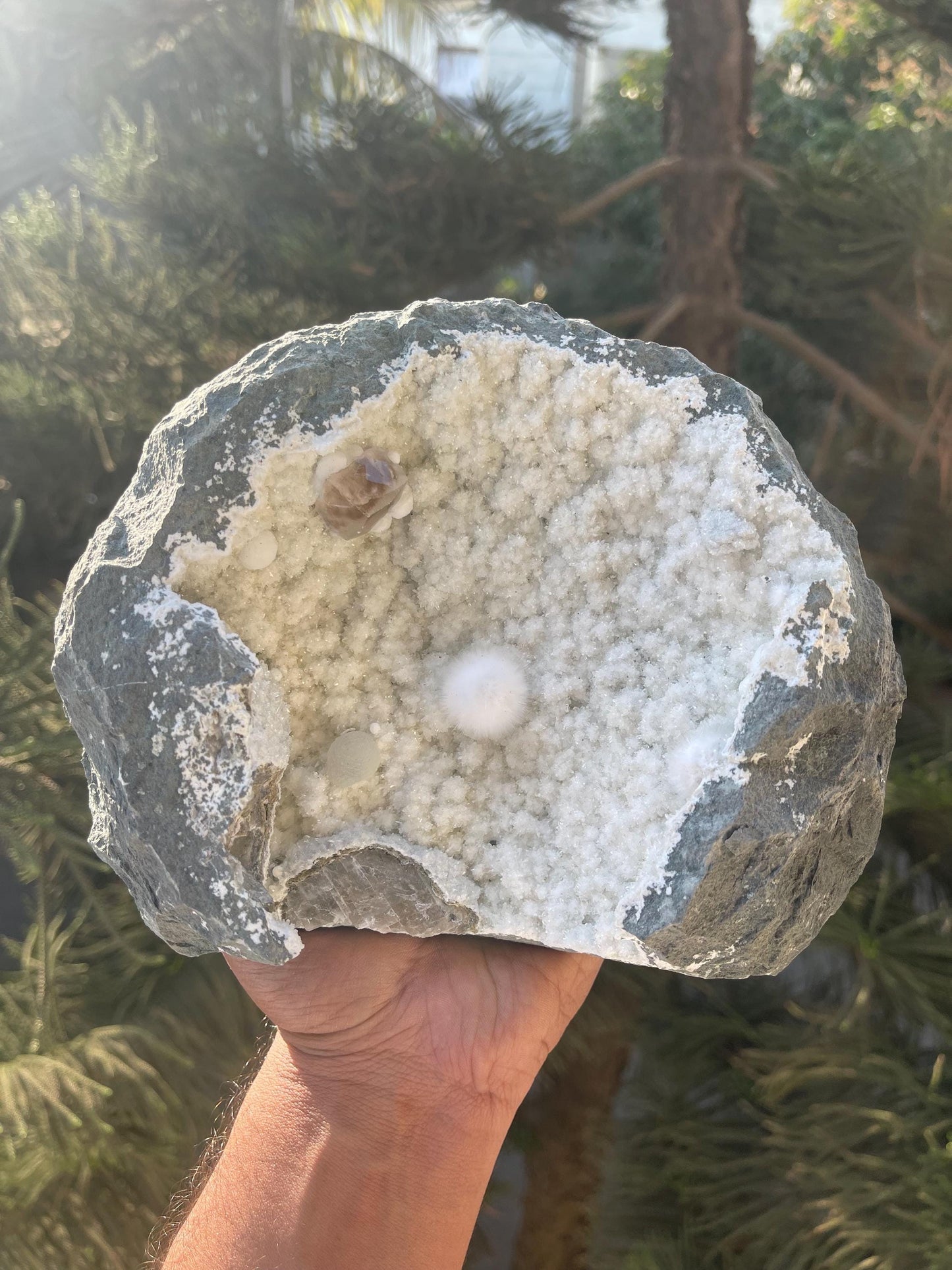 combination of okenite calcite gyrolite on white chalcedony matrix