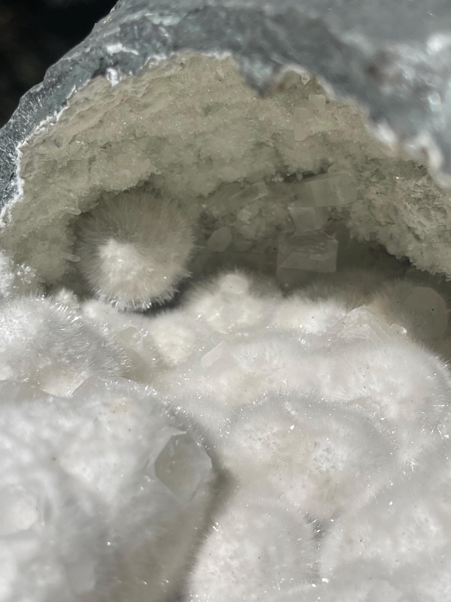 okenite big puffs balls on apophyllite inside geode