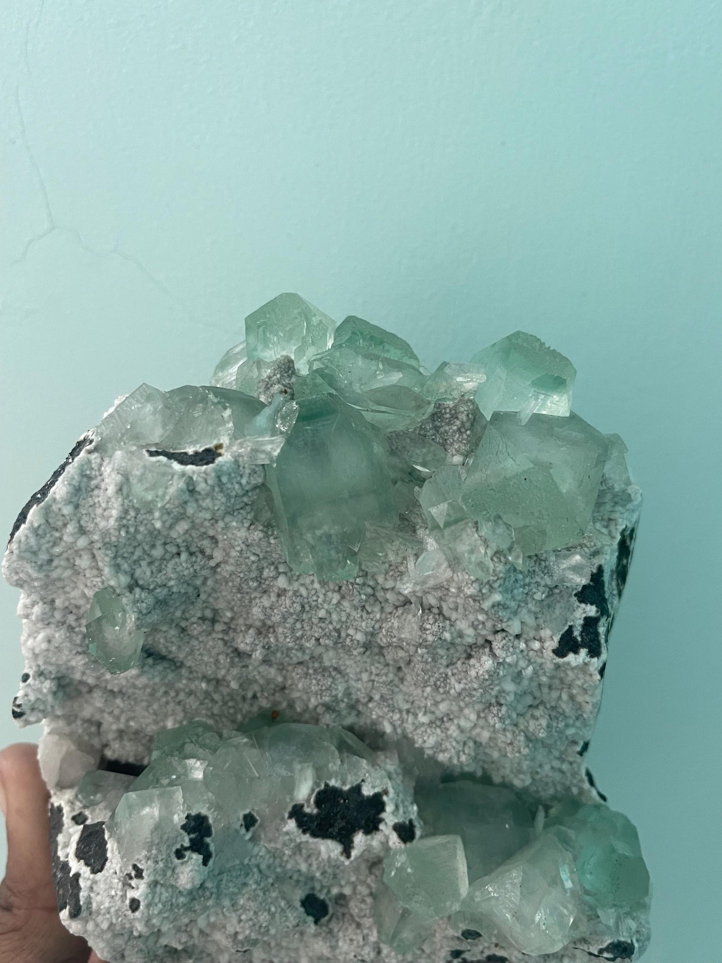 green apophyllite crystals on white chalcedony matrix