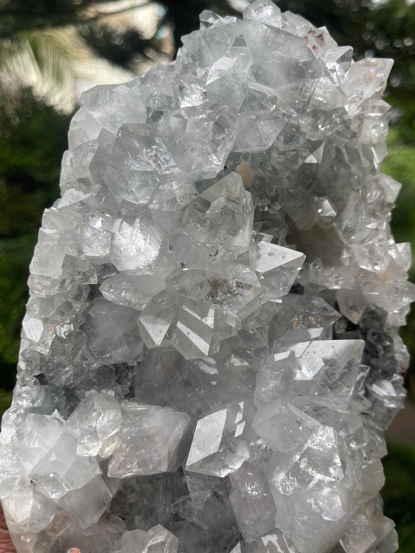 Glossy apophyllite crystal with stilbite on blue chalcedony matrix standing piece