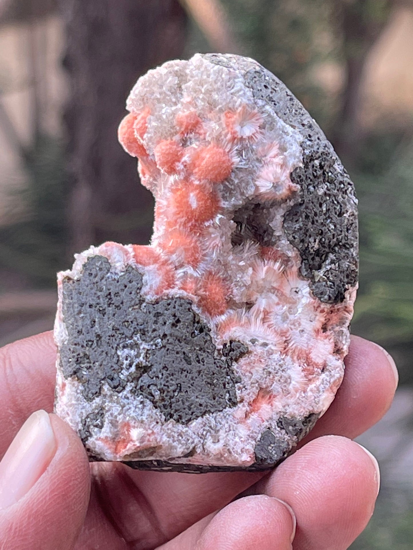 Orange mesolite balls on heulandite matrix