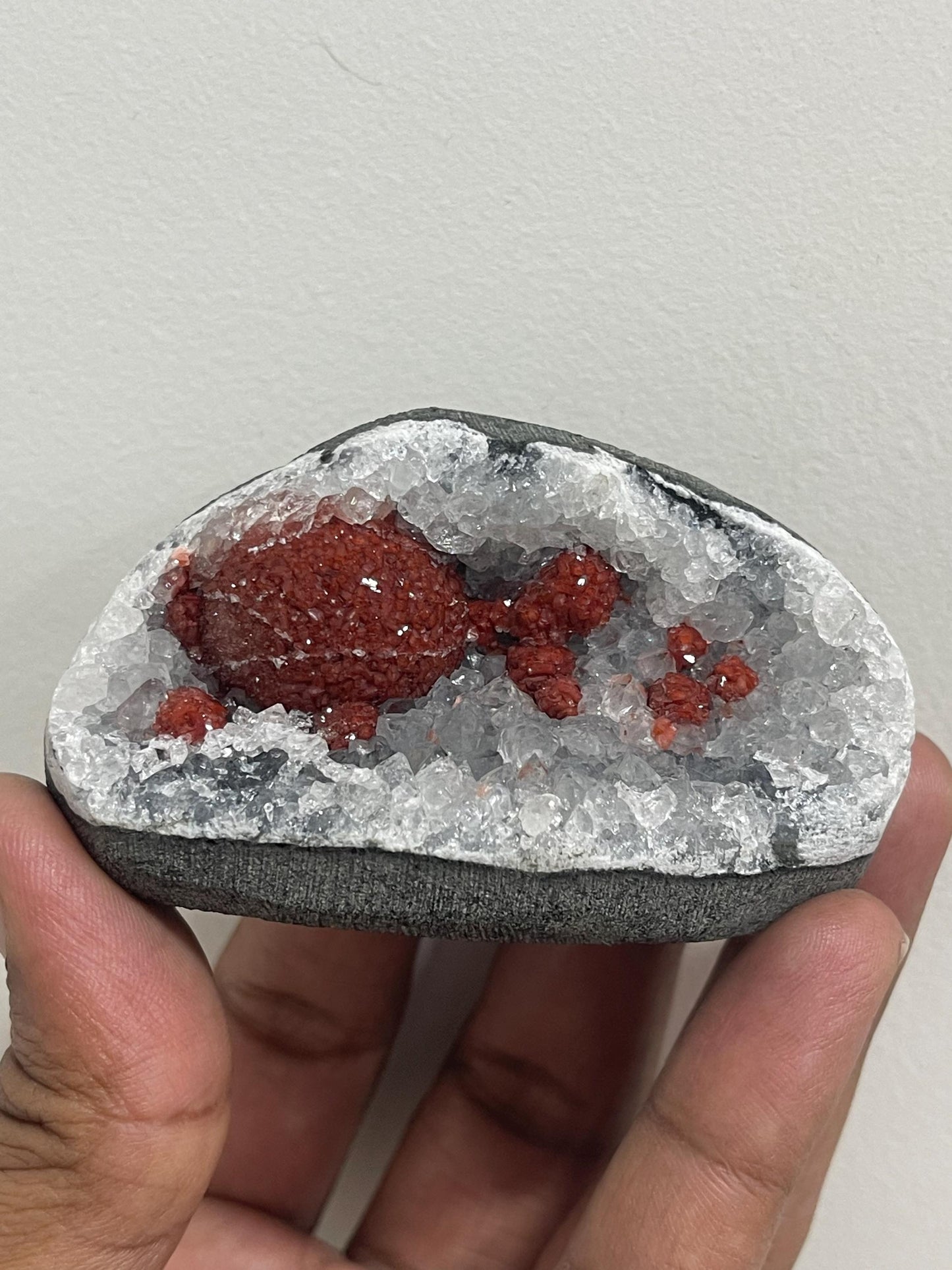 Rare find .. Red fluoride ball on blue quartz crystal