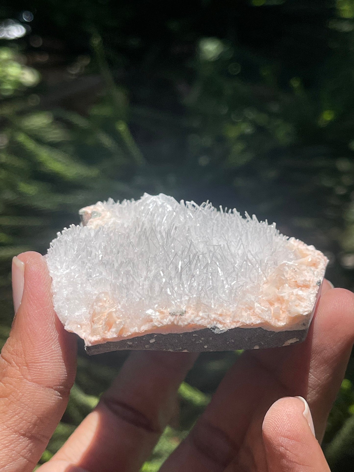 Scolecite spray on orange heulandite matrix
