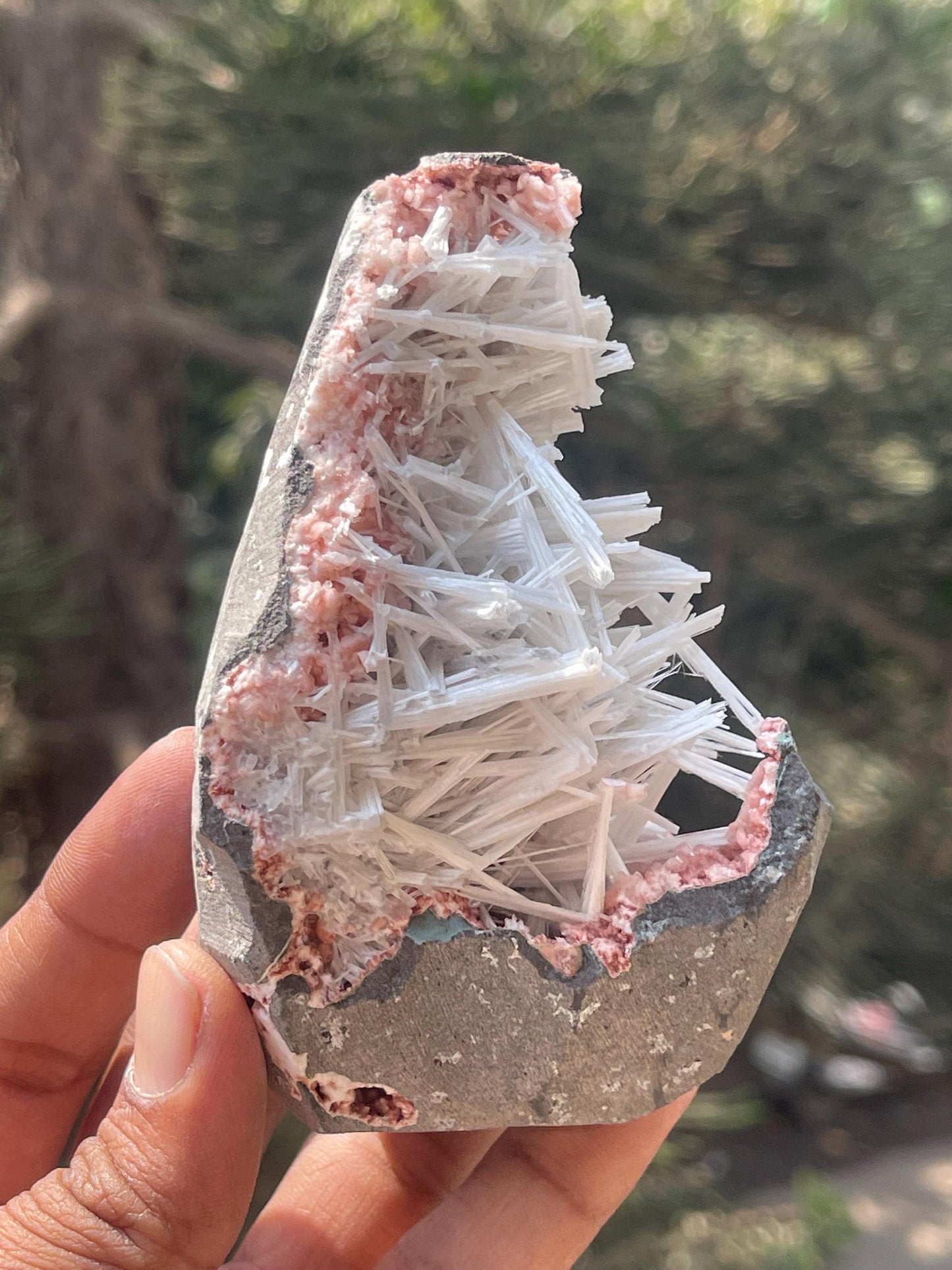 scolecite spray on orange heulandite matrix