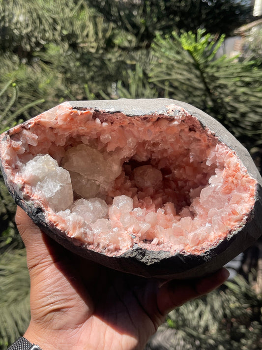 Orange heulandite with apophyllite inside geode