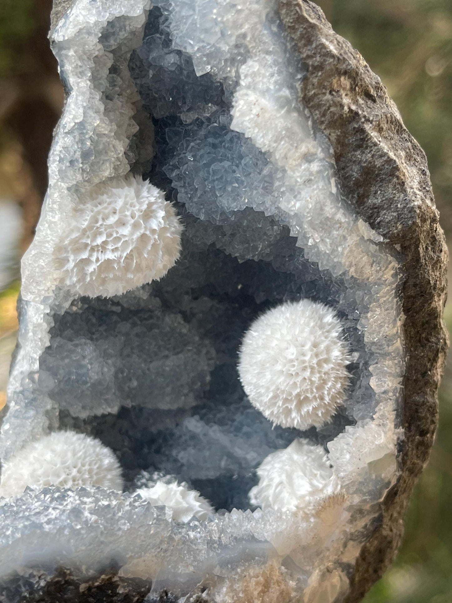 Multiple okenite ball on blue chalcedony quartz
