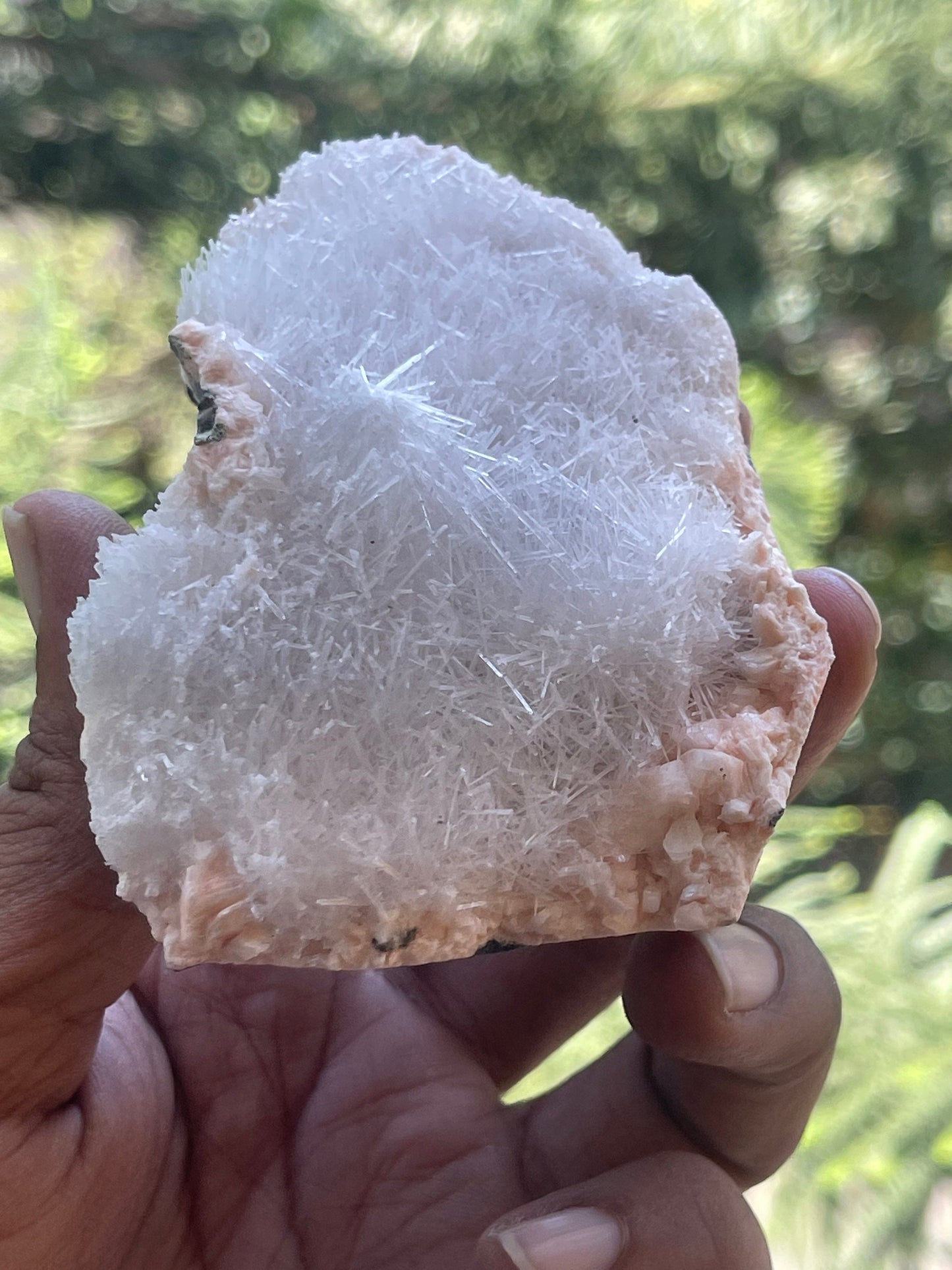 Scolecite spray on orange heulandite matrix