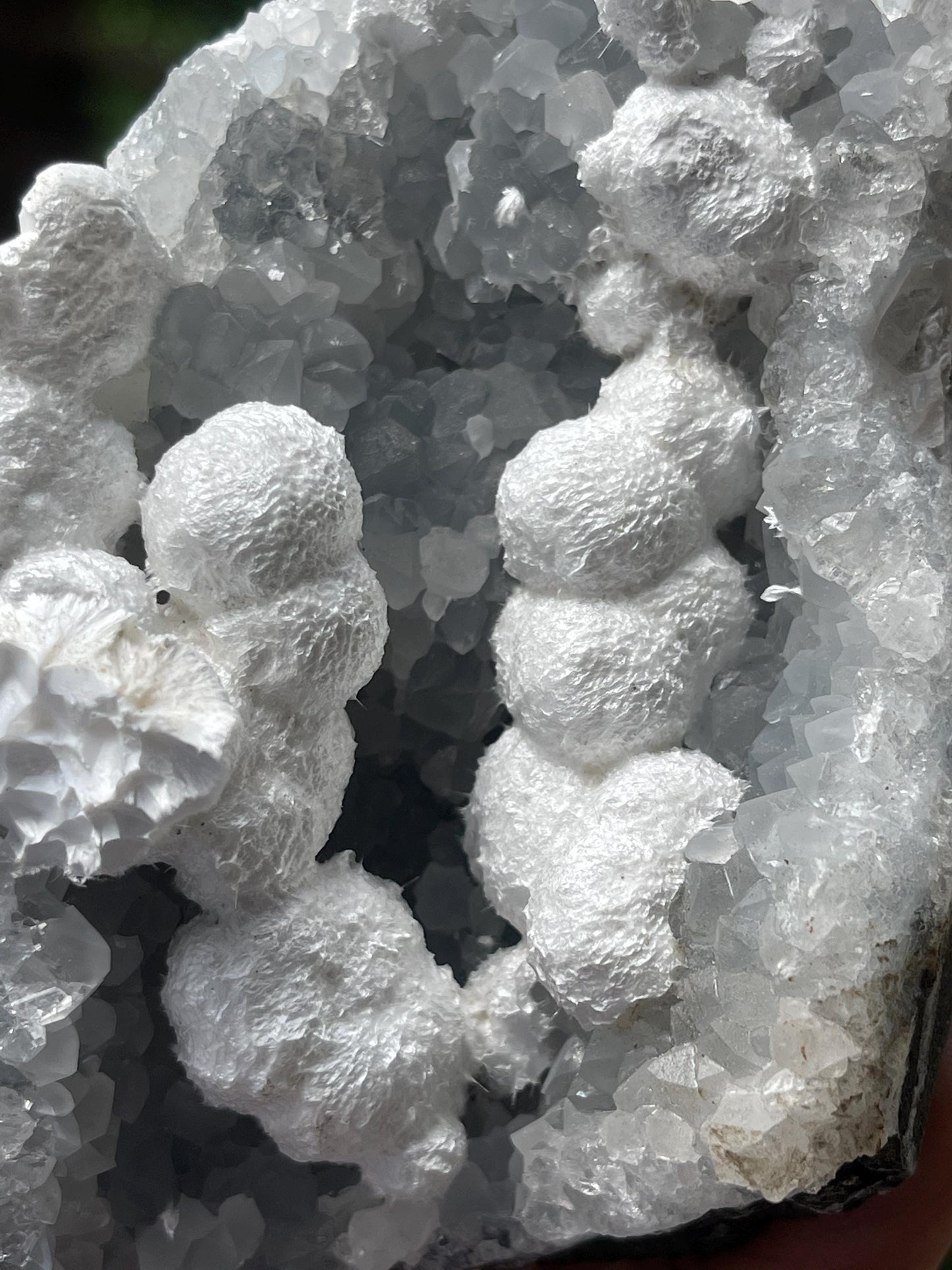 Okenite balls on blue quartz