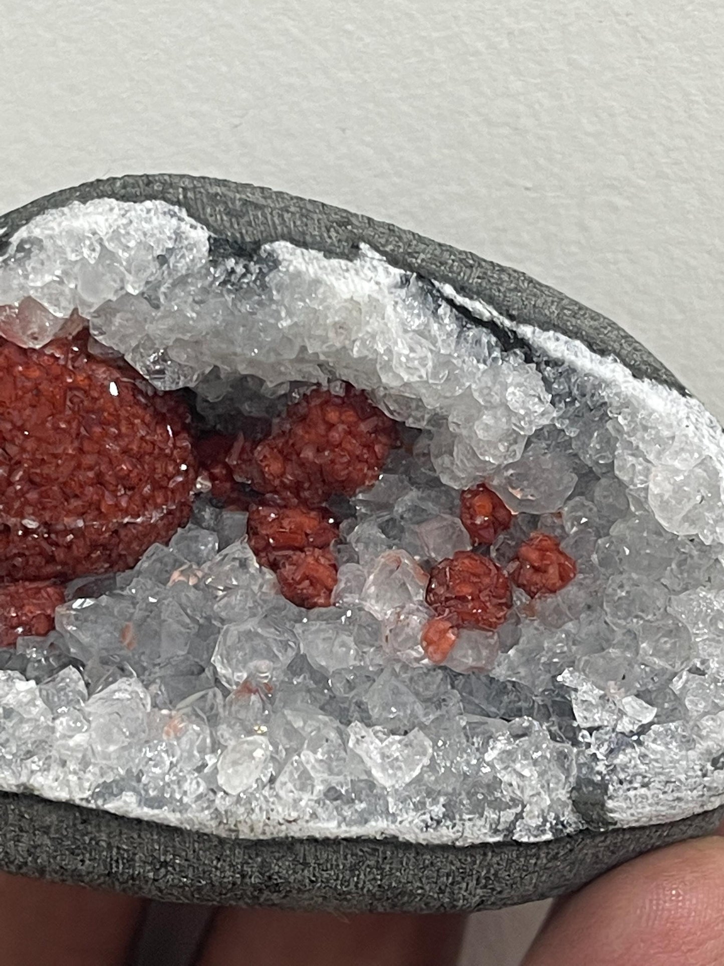Rare find .. Red fluoride ball on blue quartz crystal