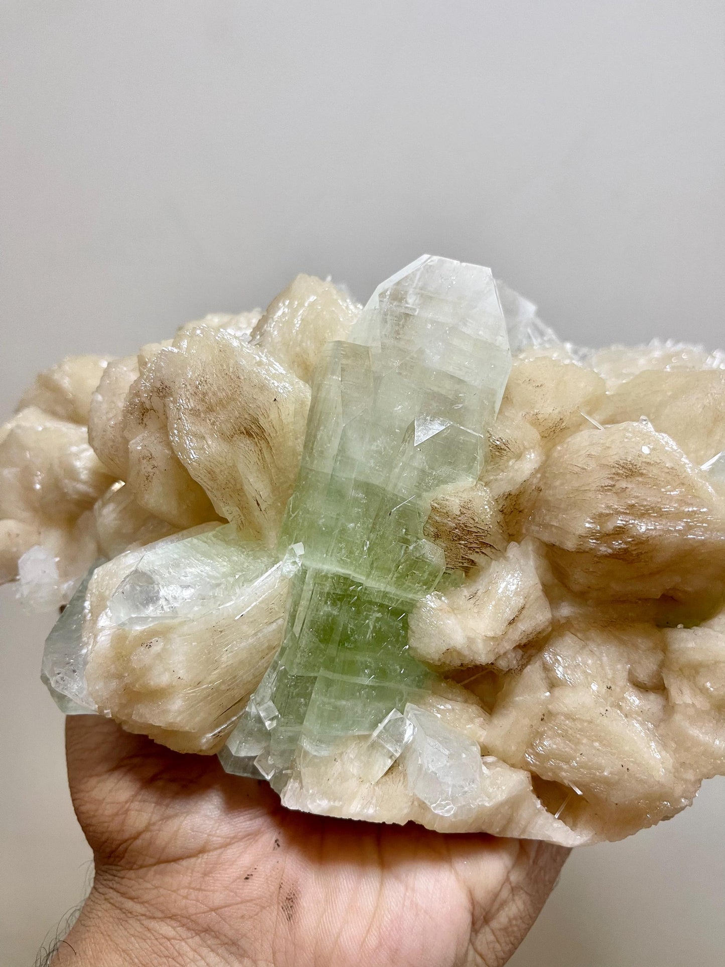 Large Green Apophyllite crystal Perfectly Paired with Peach Stilbite
