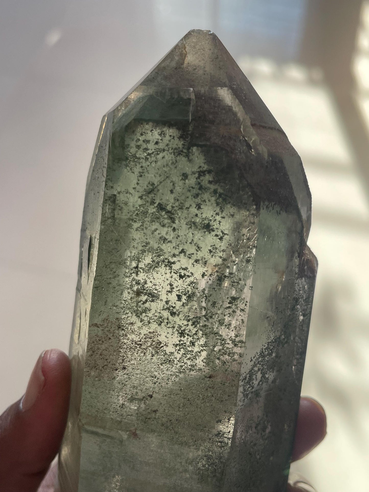 big size of Himalayan crystal inside green phantom inclusions