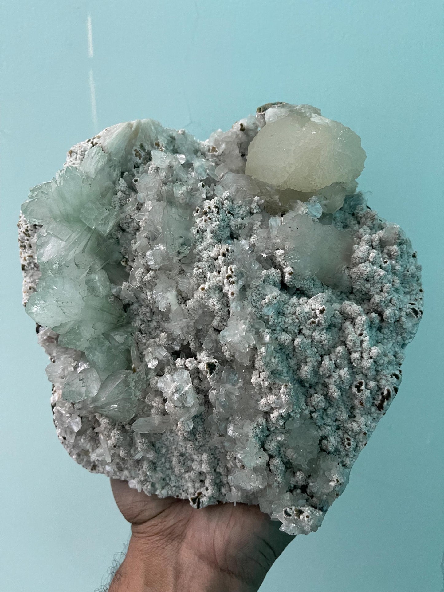 light green apophyllite crystal flower on white chalcedony matrix with stilbite