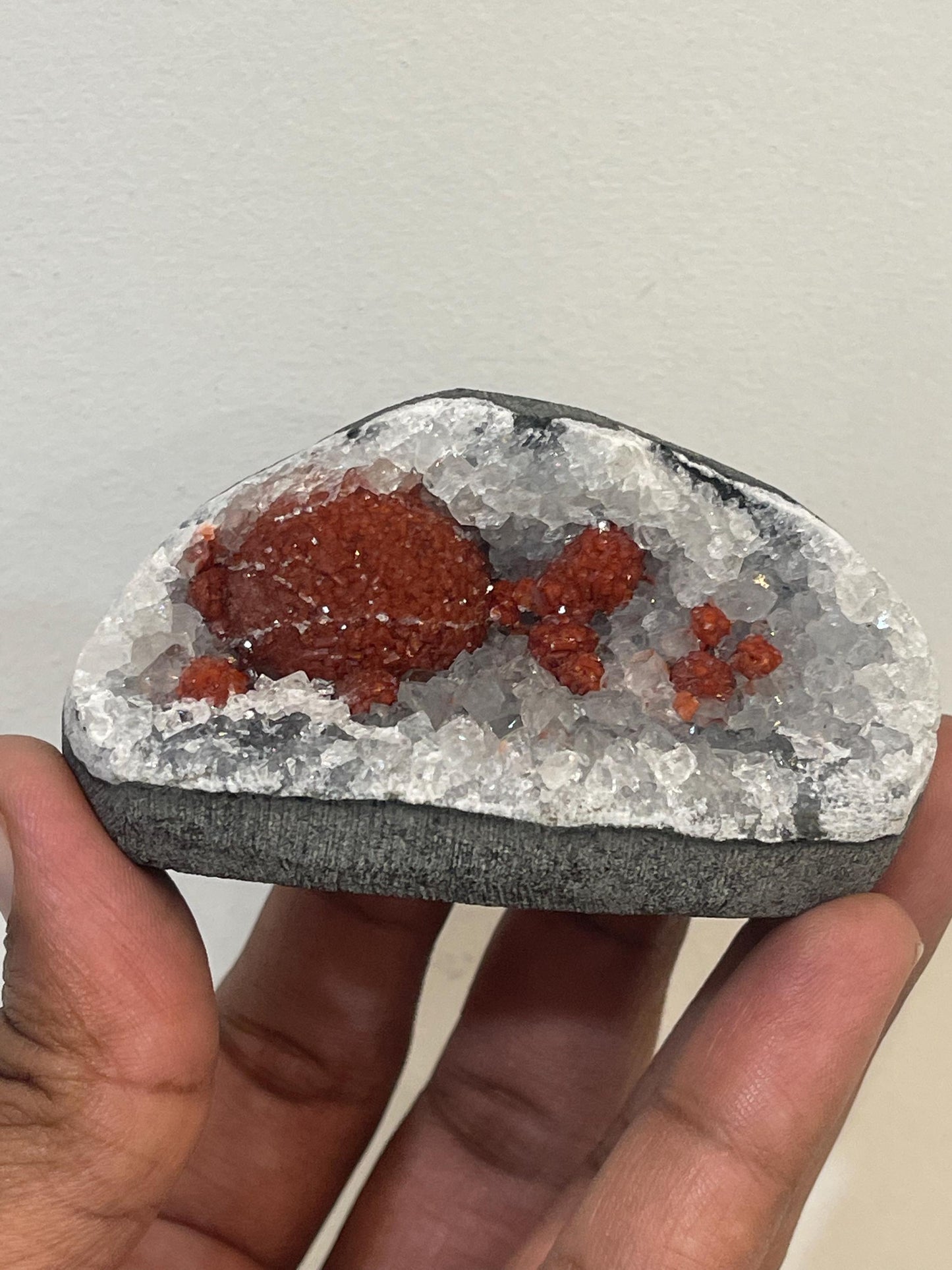 Rare find .. Red fluoride ball on blue quartz crystal
