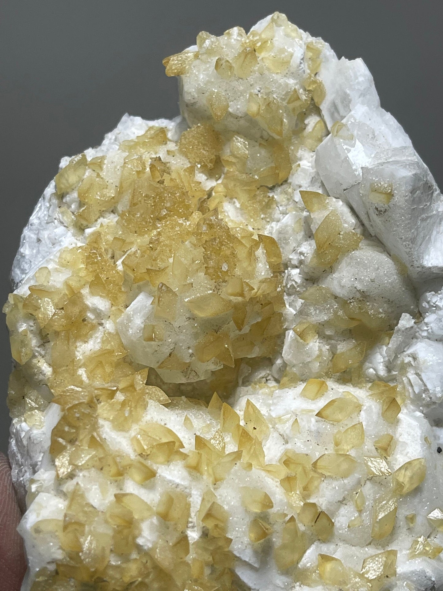 Rare find ..! Golden calcite  crystal on white apophyllite