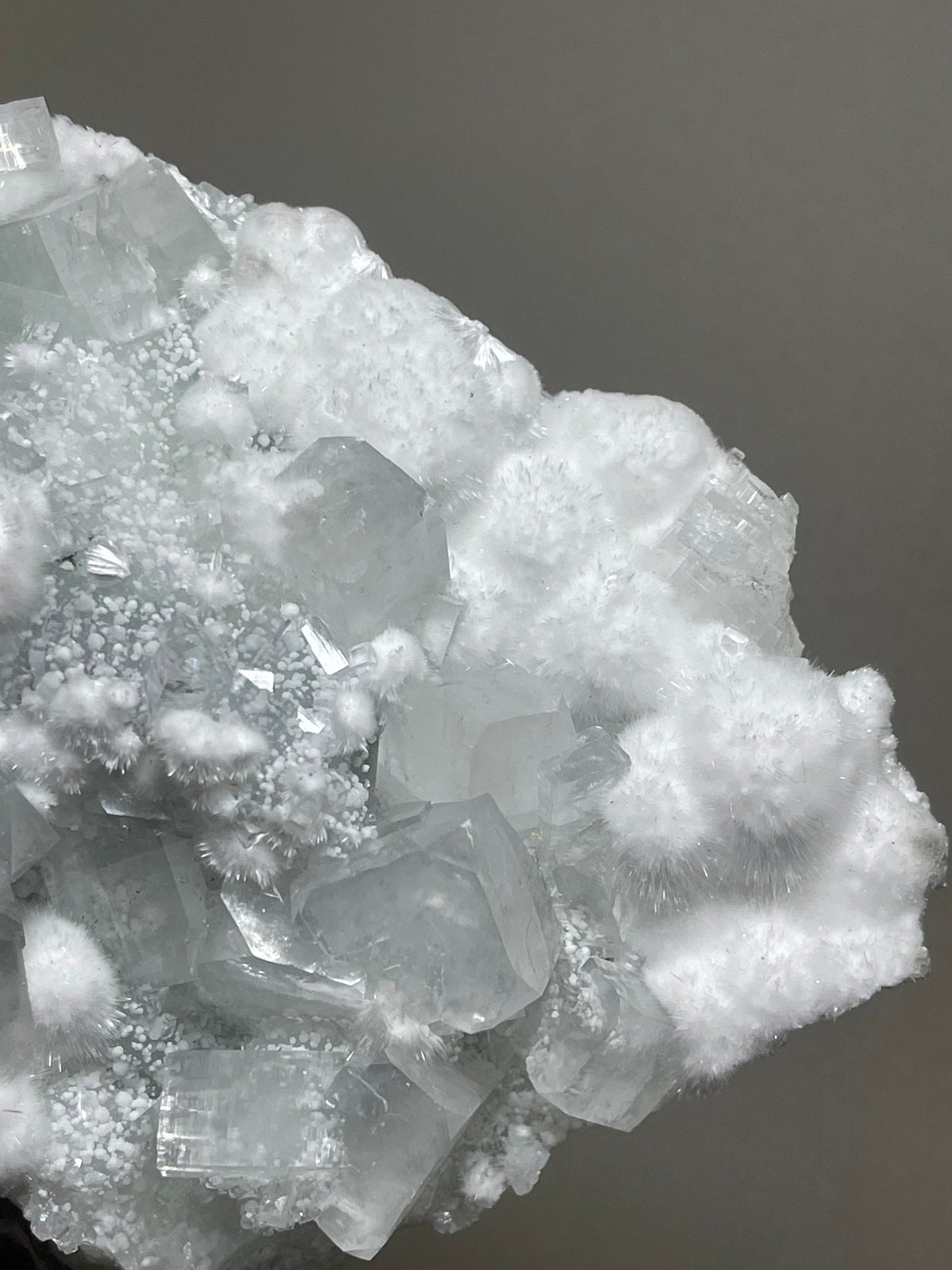 Okenite ball with apophyllite crystals