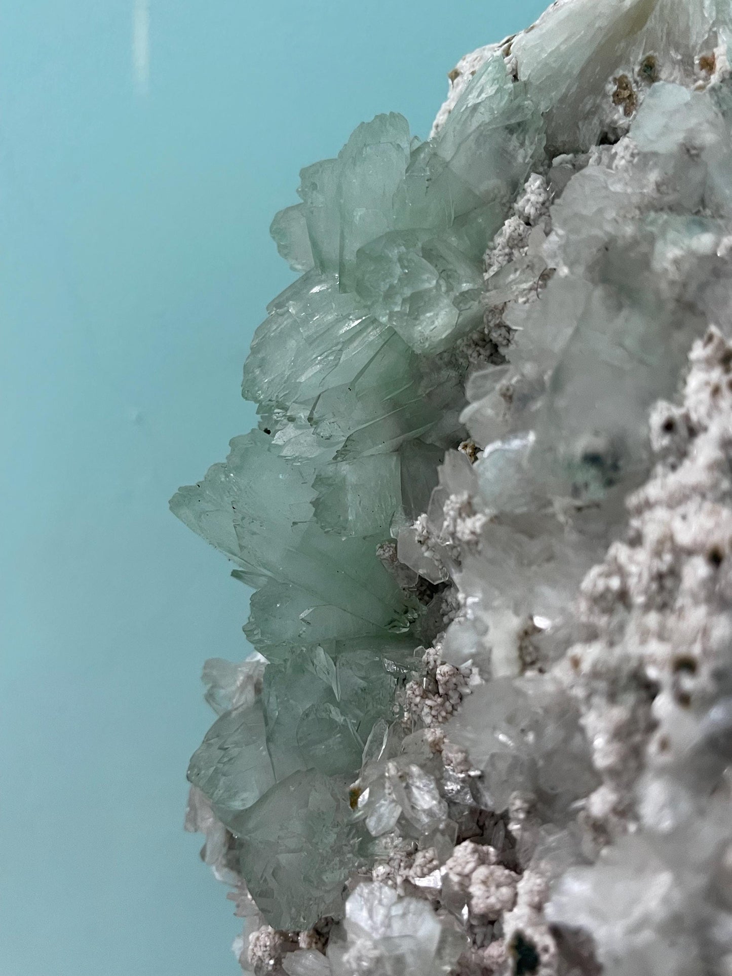 light green apophyllite crystal flower on white chalcedony matrix with stilbite
