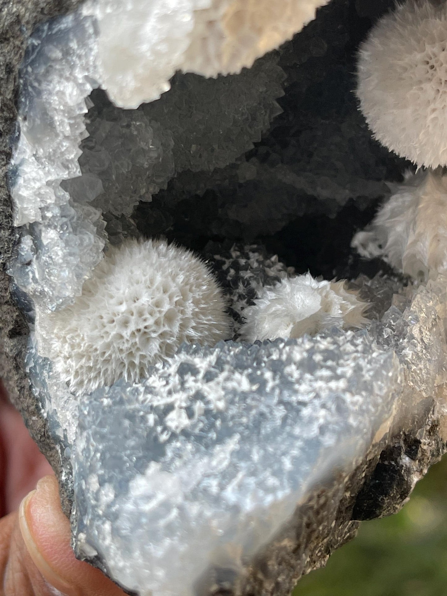 Multiple okenite ball on blue chalcedony quartz